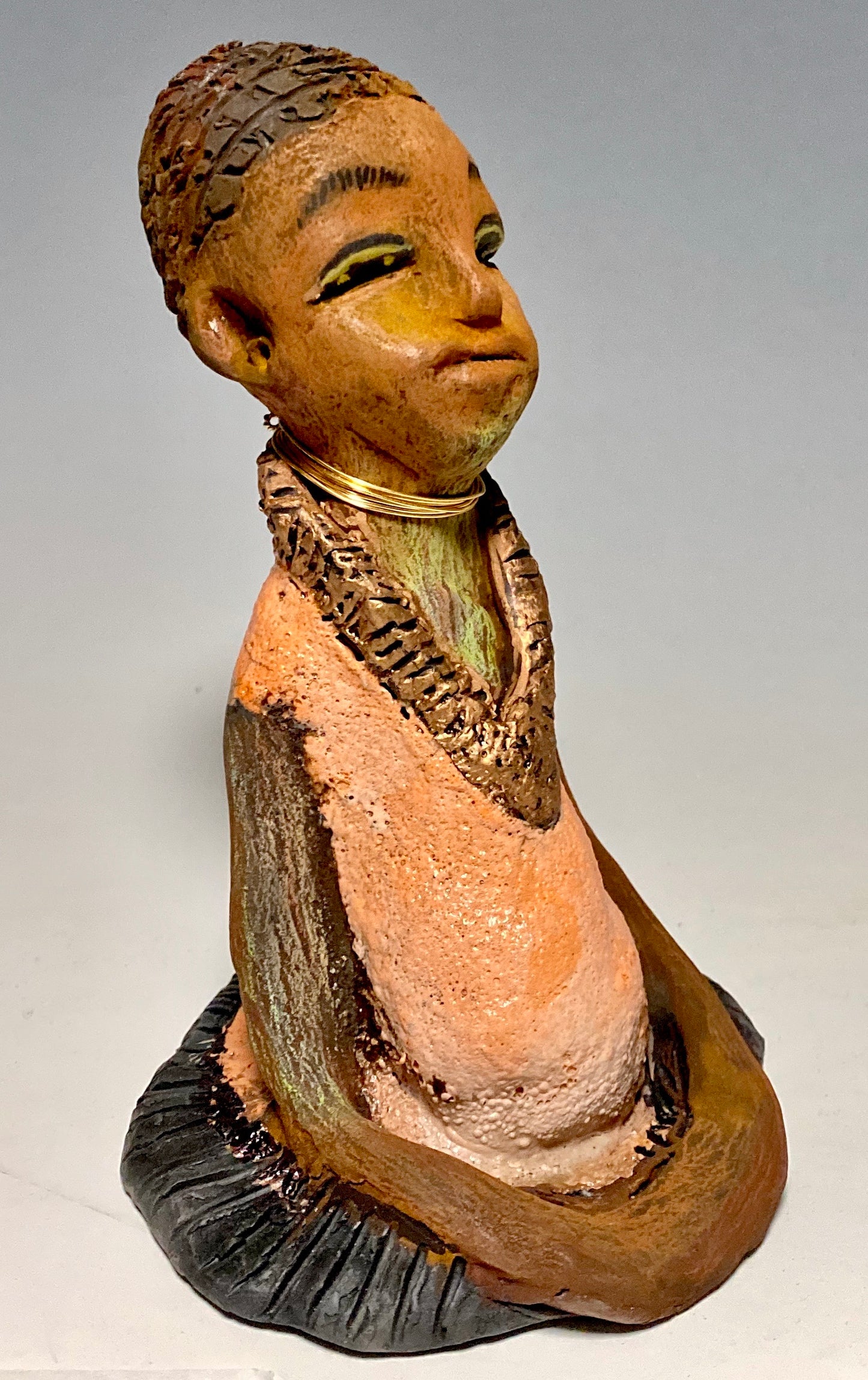 Meet Ernestine! Ernestine stands 7" x 5”x 5" and weighs 1.4 lbs. Ernestine has a lovely pale pink dress with a gold wire necklace. Ernestine appears to sit in a yoga pose. Her long arms rest at her side. With the current situation we All are facing, Ernestine will place a smile on your face during this challenging time. If not, return her within 30 days for a complete refund. Gift Cards are available!!