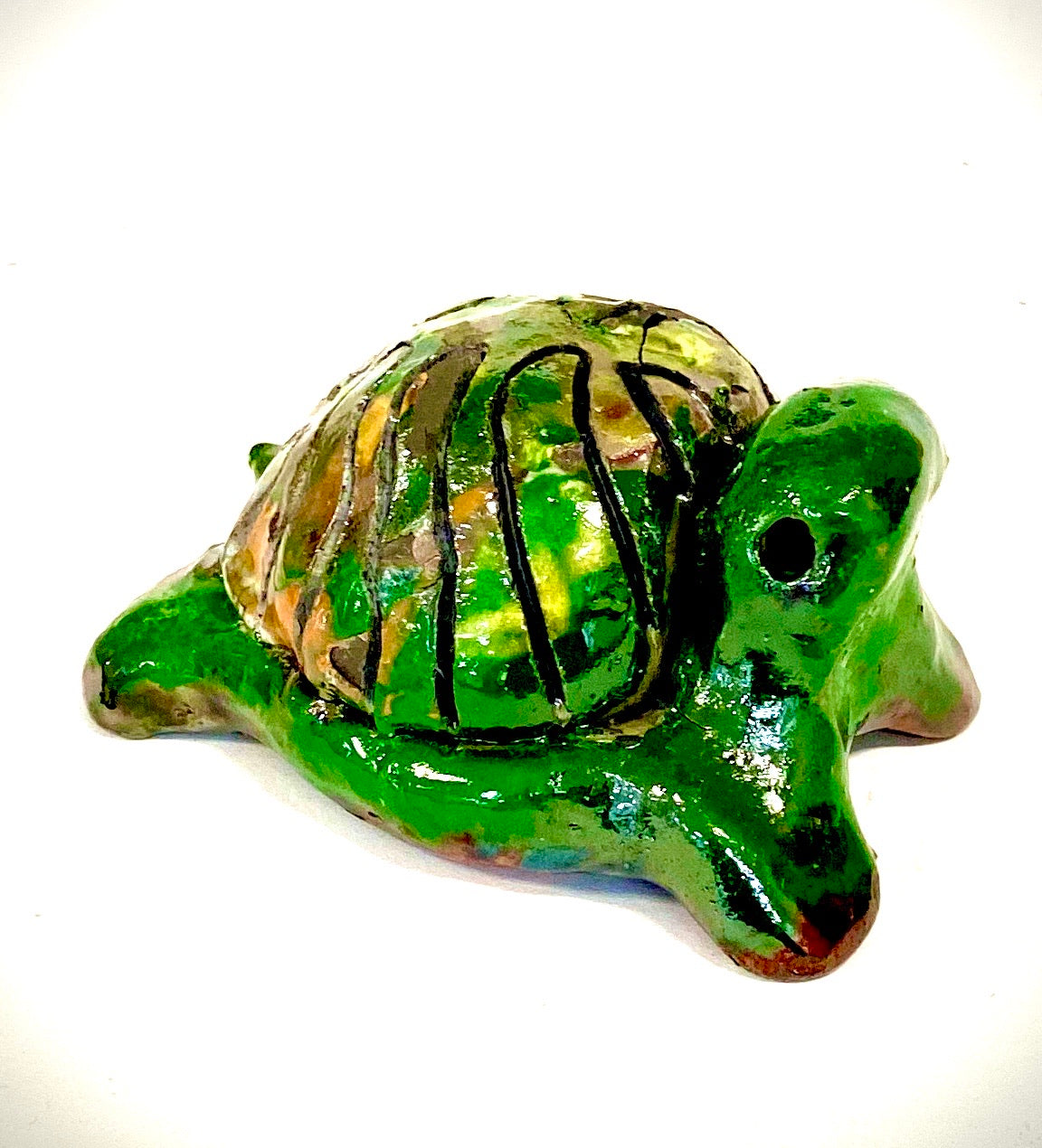 Boys, girls, men, and women of all ages talked about how cute they are. They got a kick out of and adored the turtles that were named after someone they knew". Tommie is 2" x 2" x 4" and weighs 5.8 ozs. Tommie has a glossy green and copper complexion. Tommie is ready to Go!!