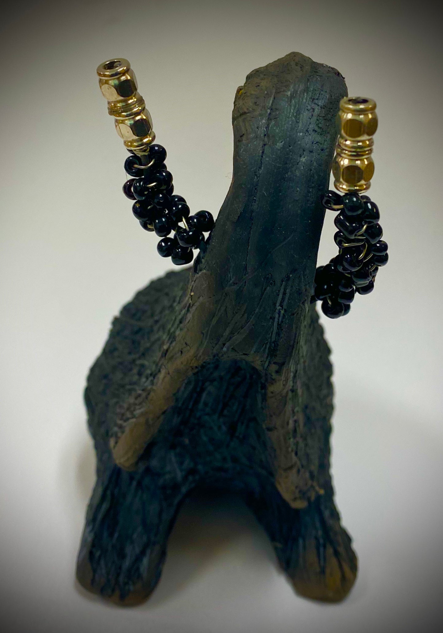 Have you HERD!!!!!! Elephants are one of my favorite animals to create. They are so majestic" Just one of these lovely Raku Fired Elephant will make an excellent gift for your BFF, or just for you . This raku fired elephant stands 7" x 2" x 2.5" and weighs 10 ounces. She has beaded tusks and a textured charcoal body. Nice!