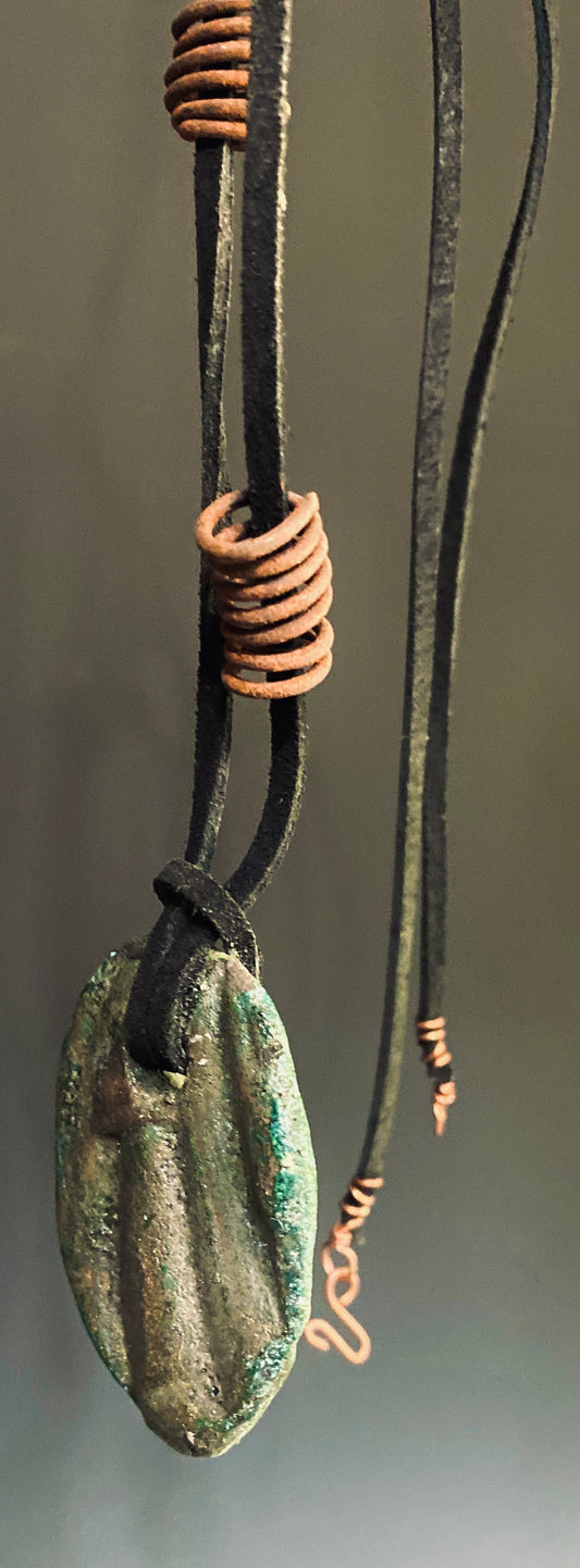 Earthy! 16"  brown suede cord. 1  earthy colored Raku disc spiral wire coils Tribal!