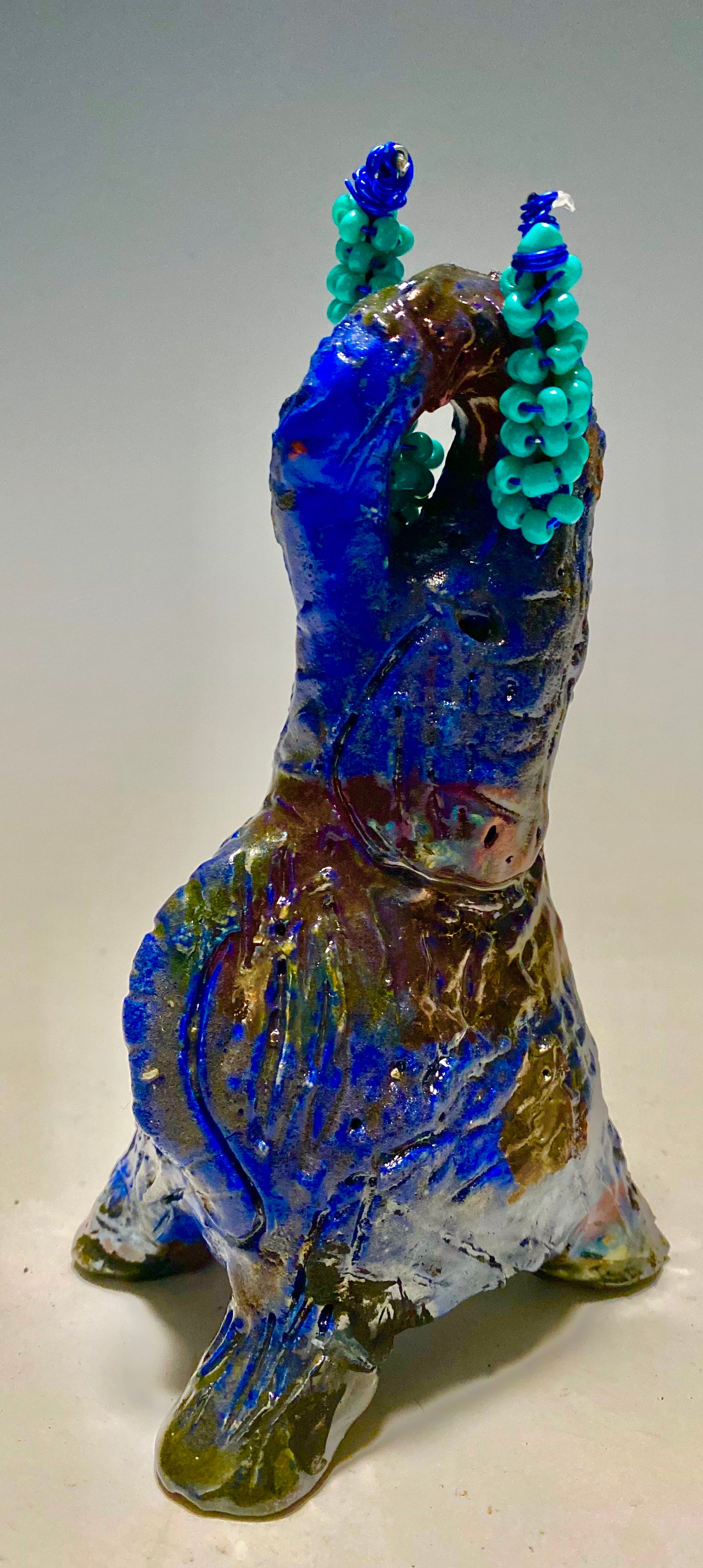 Raku Elephant Have you HERD!!!!!! Just one of these lovely Raku Fired Elephant will make an excellent gift for your friend, sorority or for your home’ special place centerpiece. Beautiful copper blue rust raku elephant. 3.5" x 3" x 3" 12 ozs Beaded tribal tusk. For decorative purposely only