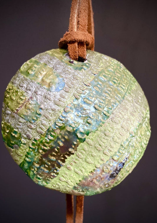Earthy! 16"  brown suede cord. 1  earthy colored Raku disc Tribal!