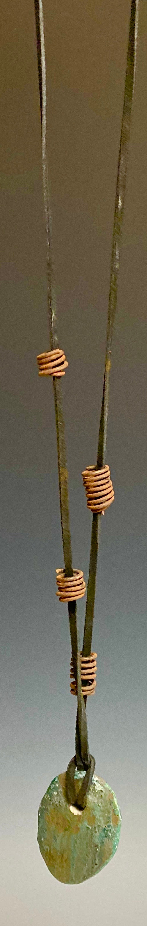 Earthy! 16" brown suede cord. 1 earthy colored Raku disc spiral wire coils Tribal!