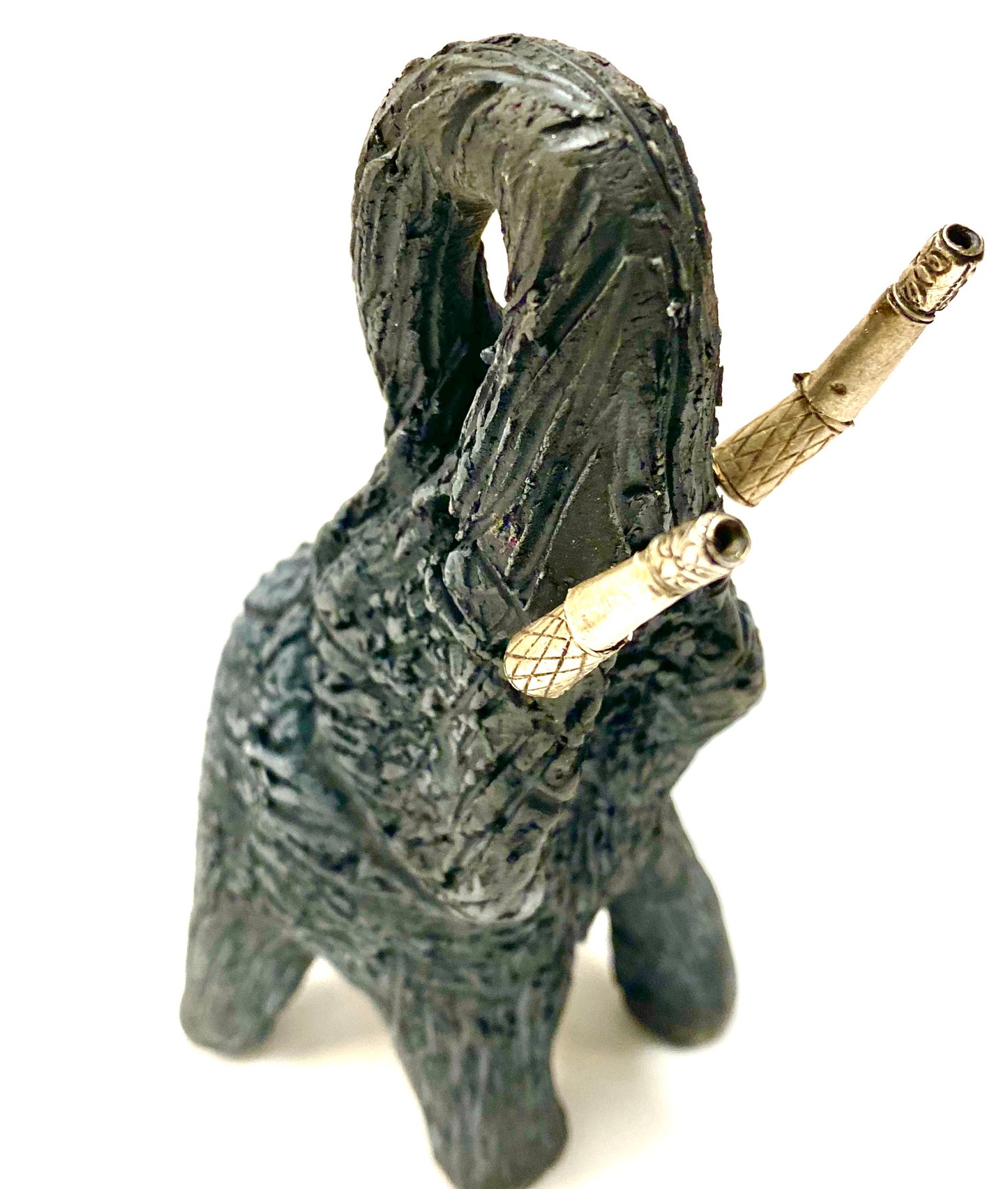 Raku Elephant Have you HERD!!!!!! Just one of these lovely Raku Fired Elephant will make an excellent gift for your friend, sorority or for your home’ special place centerpiece. 3.5" x 3" x 3.5" 1 lbs Beautiful smokey black baby raku elephant For decorative purposely only