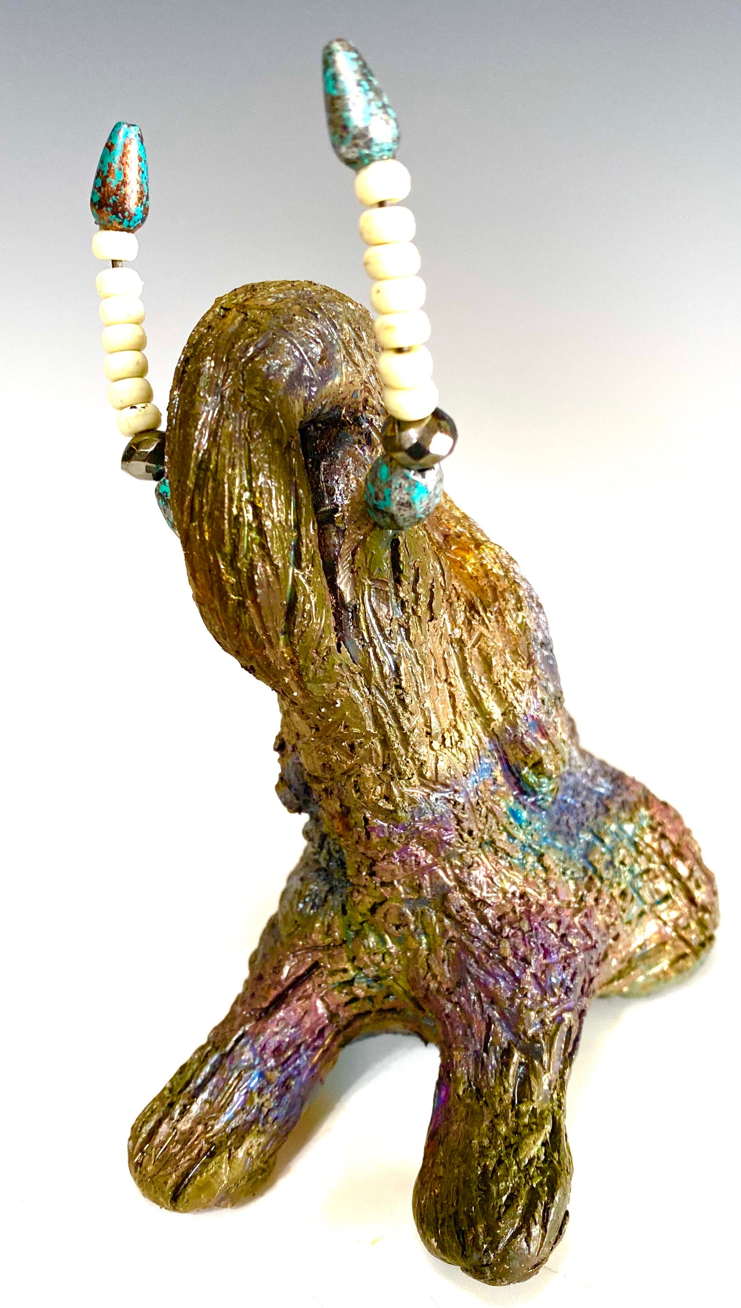 Have you HERD!!!!!! Elephants are one of my favorite animals to create. They are so majestic" Just one of these lovely Raku Fired Elephant will make an excellent gift for your BFF, or just for you . This raku fired elephant sits 5" x 2" x 2.5" and weighs 10 ounces. She has beaded tusks and a textured copper metallic body. Great for gift. Nice!