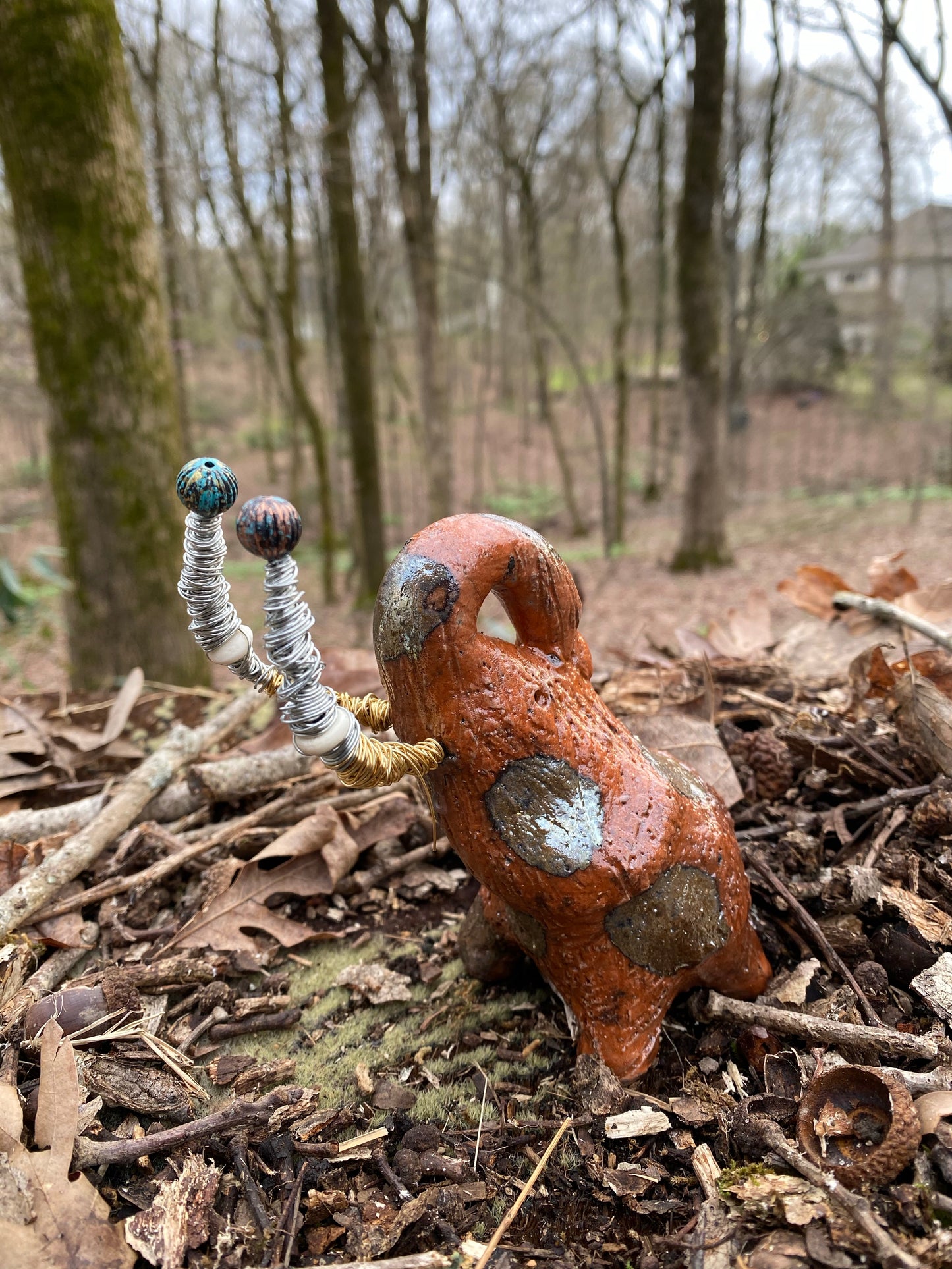 Raku Elephant Have you HERD!!!!!! Just one of these lovely Raku Fired Elephant will make an excellent gift for your friend, sorority or for your home’ special place centerpiece. 7" x 4" x 3" 11 ozs. Beautiful metallic gold and orange raku elephant For decorative purposely only.