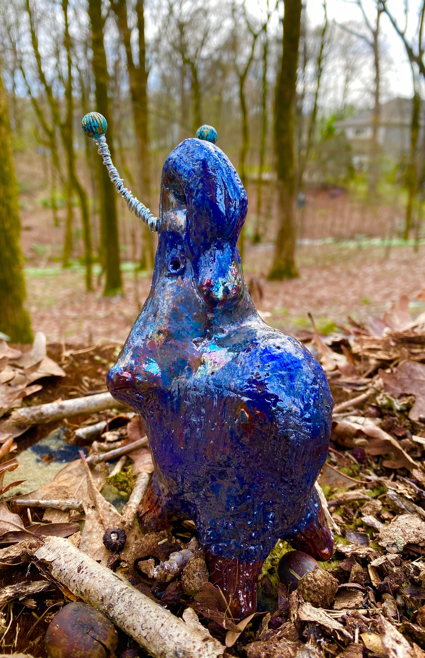 Have you HERD!!!!!! Just one of these lovely Raku Fired Elephant will make an excellent gift for your friend, sorority or for your home’ special place centerpiece. 7" x 4" x 4" 15 ozs. Silver wire beaded blue tusk Beautiful metallic blue raku colors For decorative purposely only.