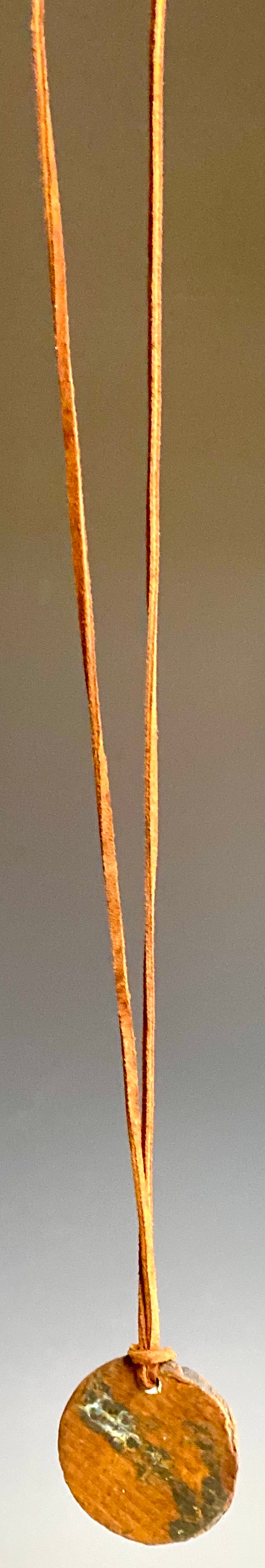 Earthy! 16" brown suede cord. 1 earthy colored Raku disc Tribal!