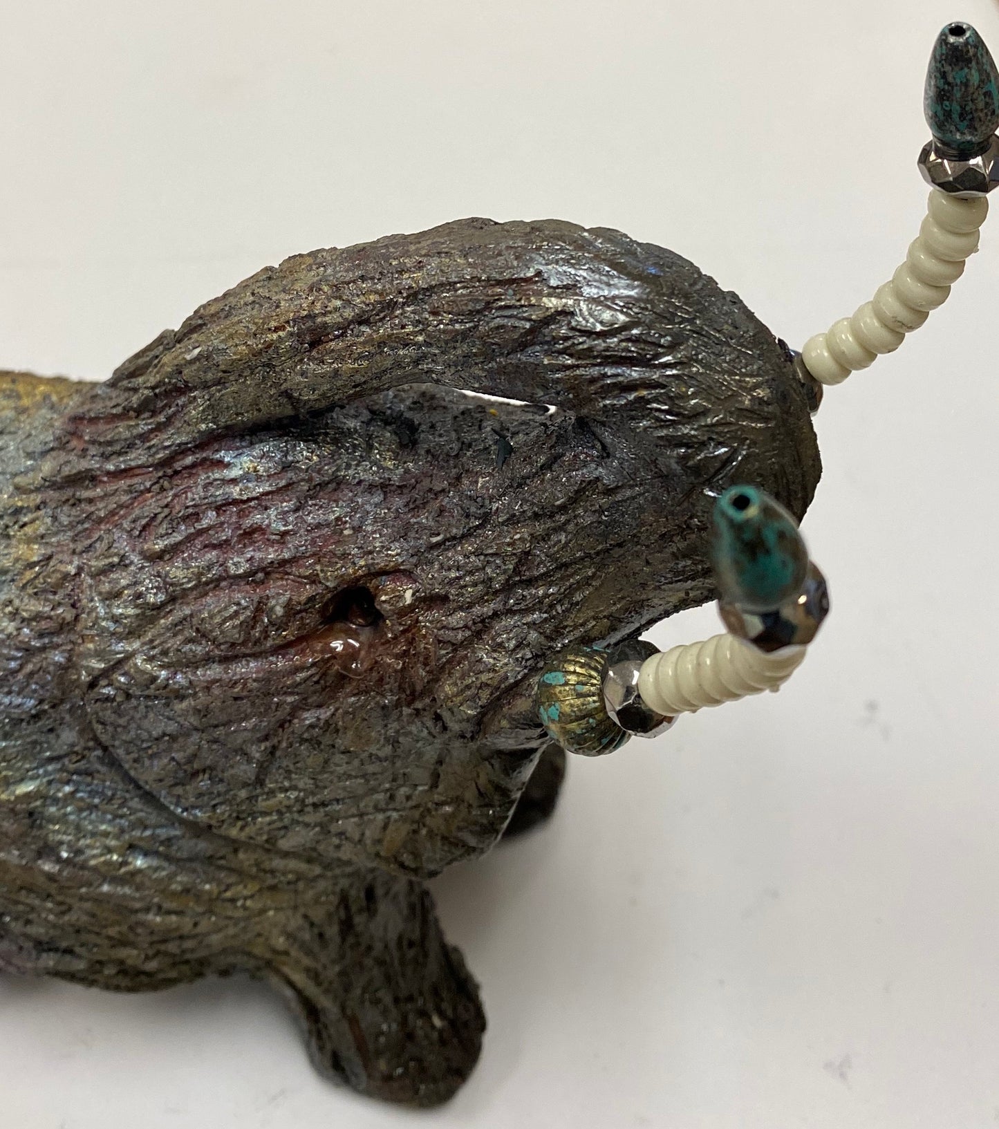 Raku Elephant Have you HERD!!!!!! Just one of these lovely Raku Fired Elephant will make an excellent gift for your friend, sorority or for your home’ special place centerpiece. 6" x 4" x 4" 1lbs Beautiful metallic raku elephant For decorative purposely only.