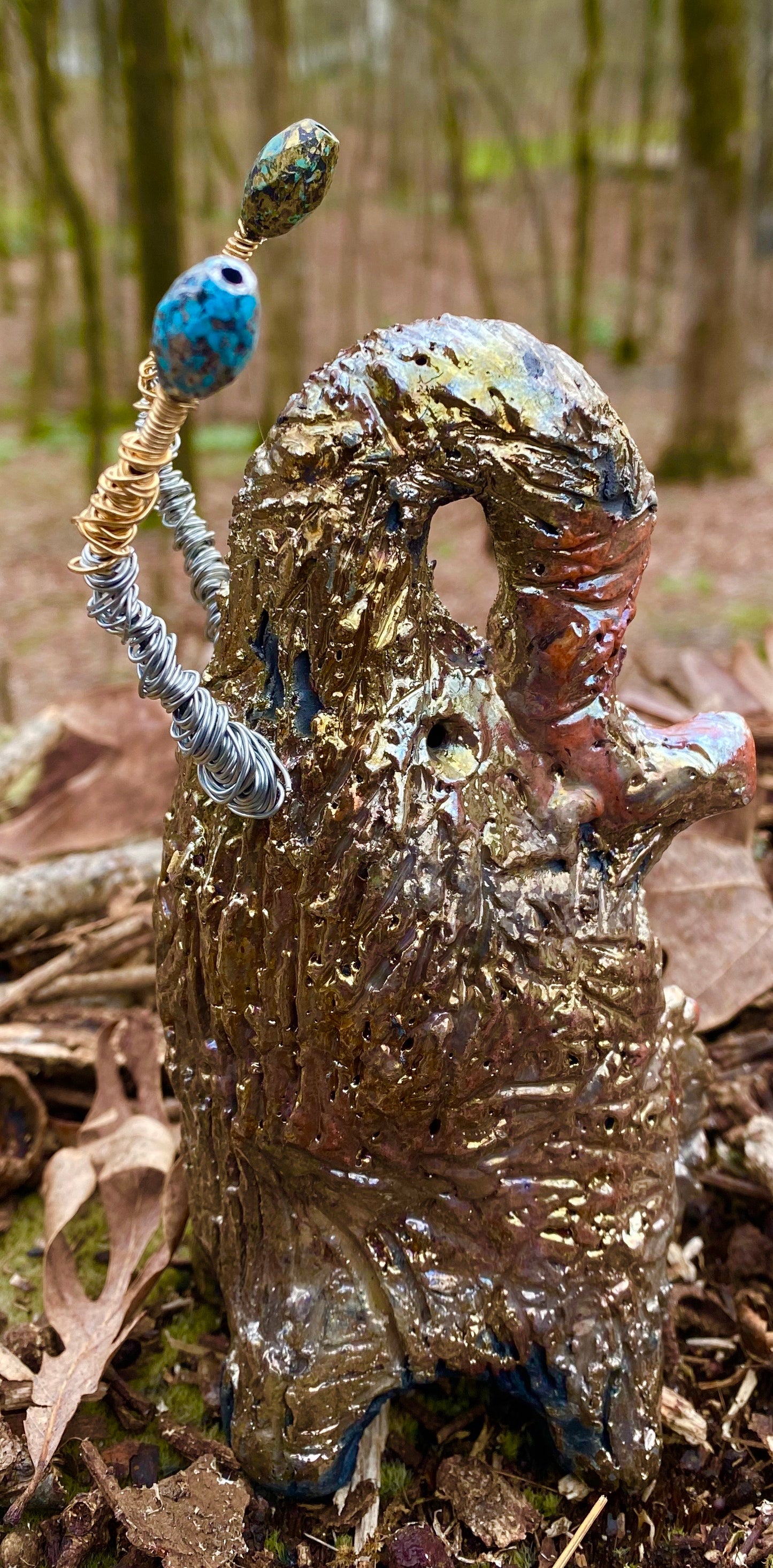 Raku Elephant Have you HERD!!!!!! Just one of these lovely Raku Fired Elephant will make an excellent gift for your friend, sorority or for your home’ special place centerpiece. 6.5" x 3" x 4" 10 ozs Silver and gold beaded tusk Beautiful gold metallic raku elephant For decorative purposely only
