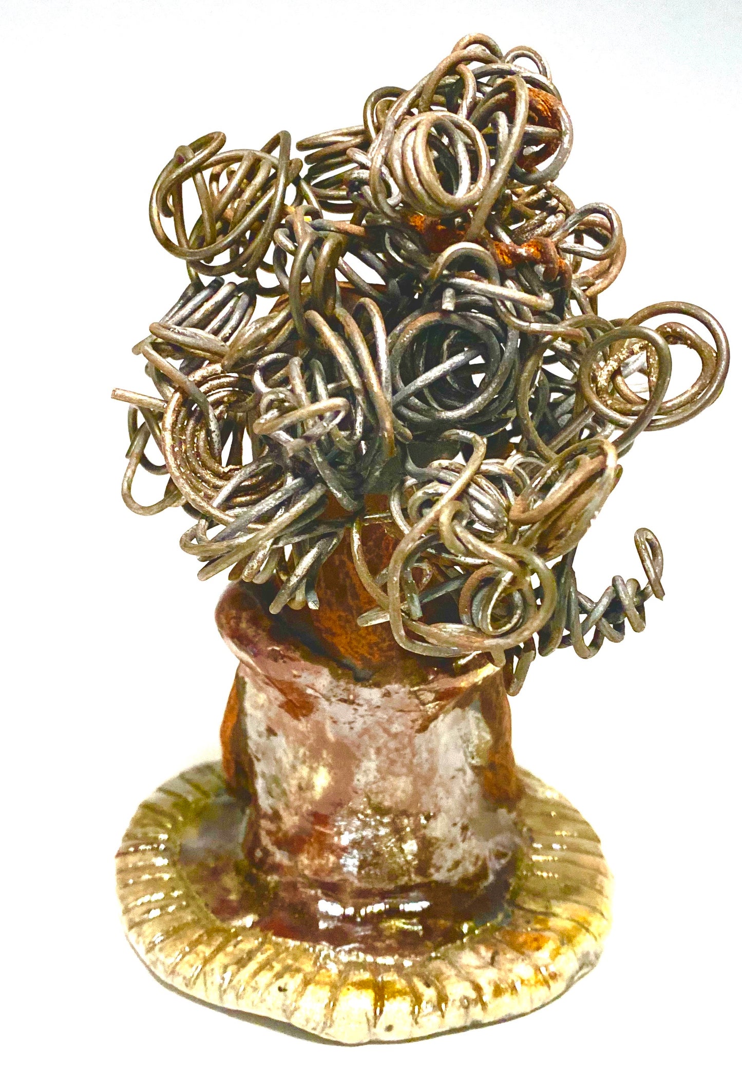 Meet Carleen! Carleen stands 6" x 4" x 4" and weighs 12 ozs. Carleen has a honey brown complexion with 16 gauge curled wire hair. She wears an copper metallic dress. Carleen has her long loving arms at her side as she rest and waits.