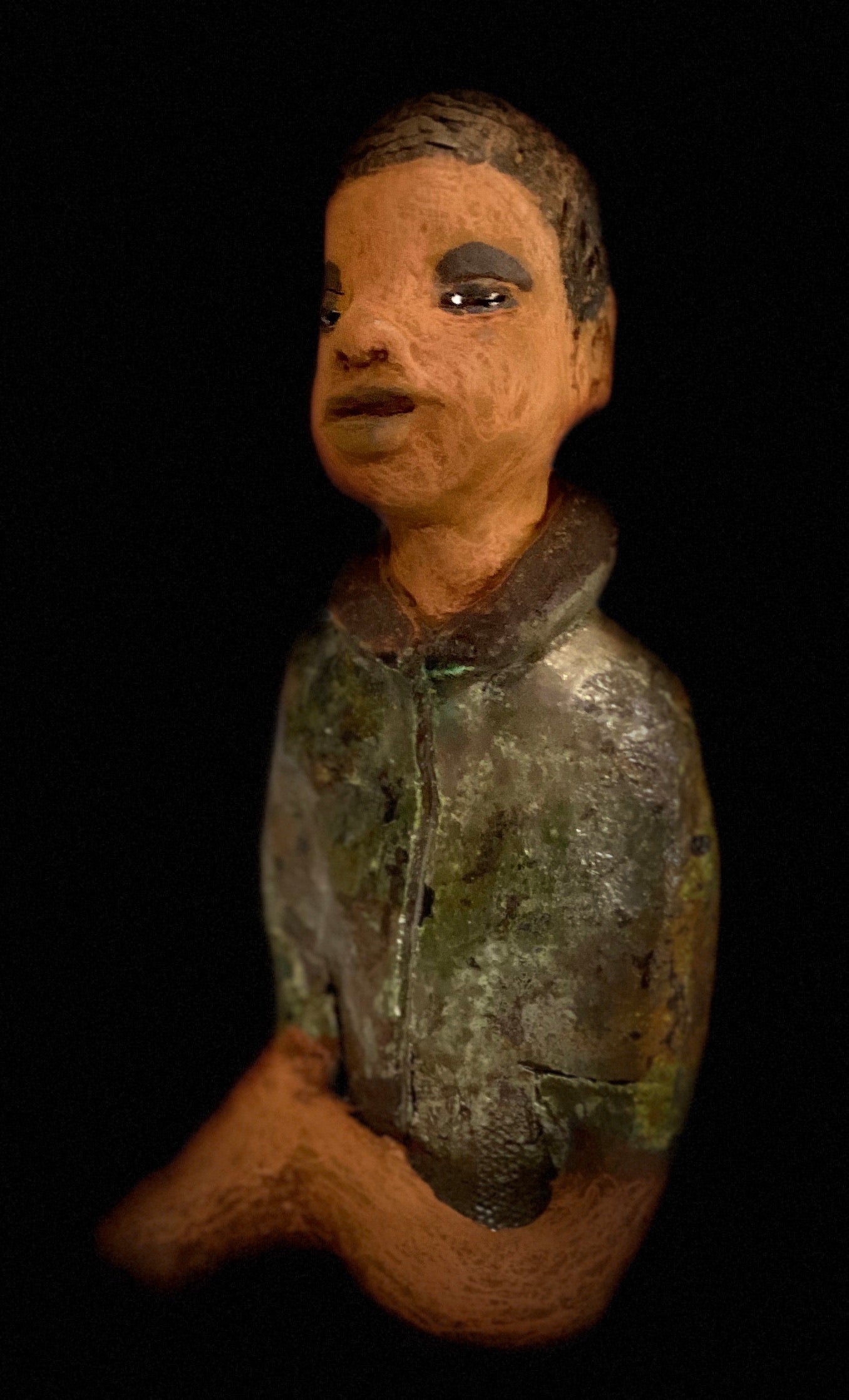 Ray is one confident teen who is ready to make his mark! Ray stands 7"x 3" x 3" and weighs 14 ozs. He has a green metallic jacket with a high collar . Ray complexion is honey brown. His arms are folded as he ponders which college scholarship to accept!!