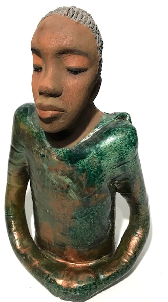 Ivani s the third young man to be introduced in this collection.     Ivan stands 17" x 9" x 10" and weighs 8.12 lbs.     Ivan has an awesome honey brown complexion.     He wears copper green hoodie     Ivan's  hair is made of  clay, black grey, and wavy.  Give Ivan a special place in your home. Free Shipping!