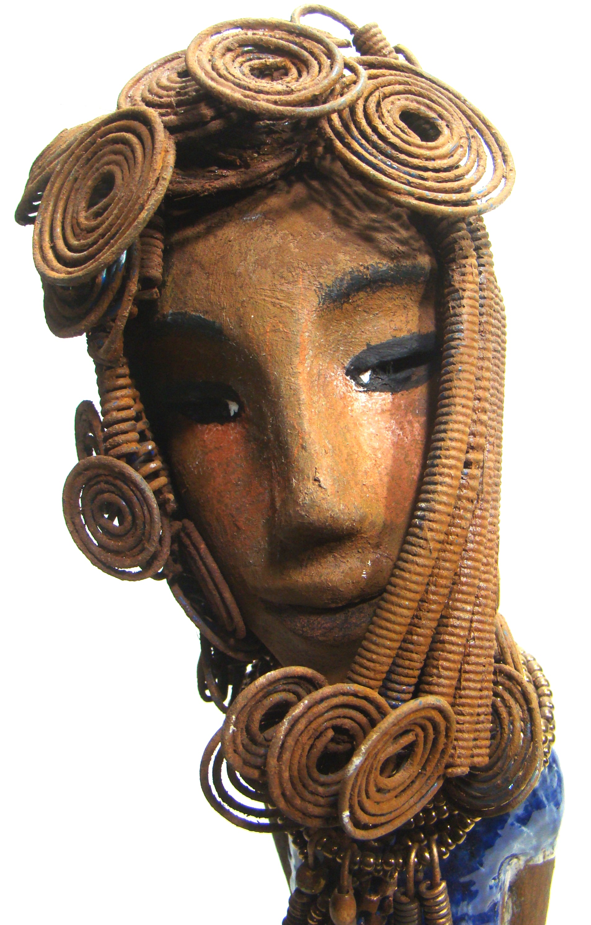 Kya stands 20" x 8" x 5" and weighs 6.04 lbs.     She has a lovely honey brown complexion.     Kya has over 40 feet of rust wire coils and spiral hair.     Her dress is a metallic blue with streaks of copper.     Her necklace is made from rust wire coils and amber beads.     Kya has long loving arms that are placed behind her.     Kya radiates like a blue diamond in the sky.     Give Kya a special place in your home!     Free Shipping!