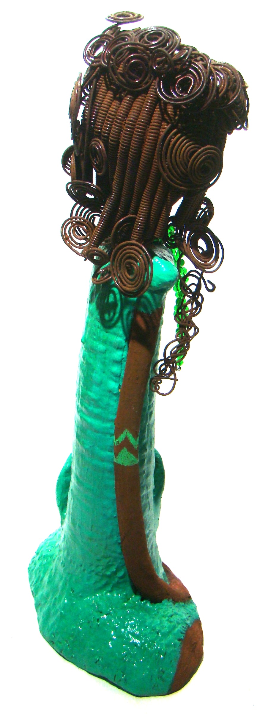 Melissa stands 18" x 9" x 5" and weighs 6.6 lbs. She has over 30 feet of wire curls, twist, and coiled hair. Melissa has a lovely honey brown complexion. She has a aqua blue green dress with matching open purse. Melissa is a tall statuesque goddess that awaits a new home. Free Shipping!