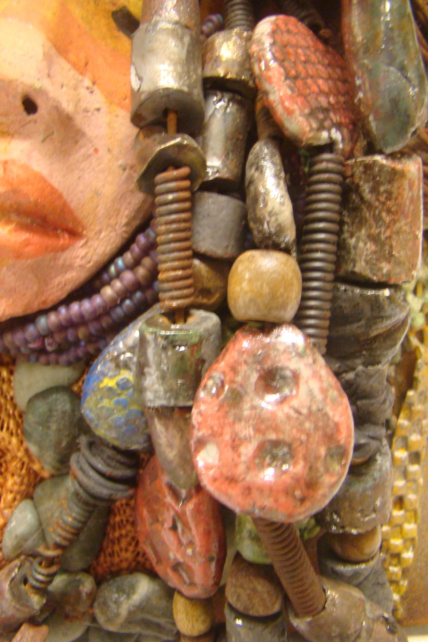 Petra is mounted on a 9"x 12" painted canvas. I spent about 4 hours or more just fixing Petra's hair and attaching beads! Petra has over 40 feet of 16 gauge wire for hair and over 50 raku beads. Petra has an amber and brown crackle face with rust brown lips. Petra is ready to be hung! Free Shipping!