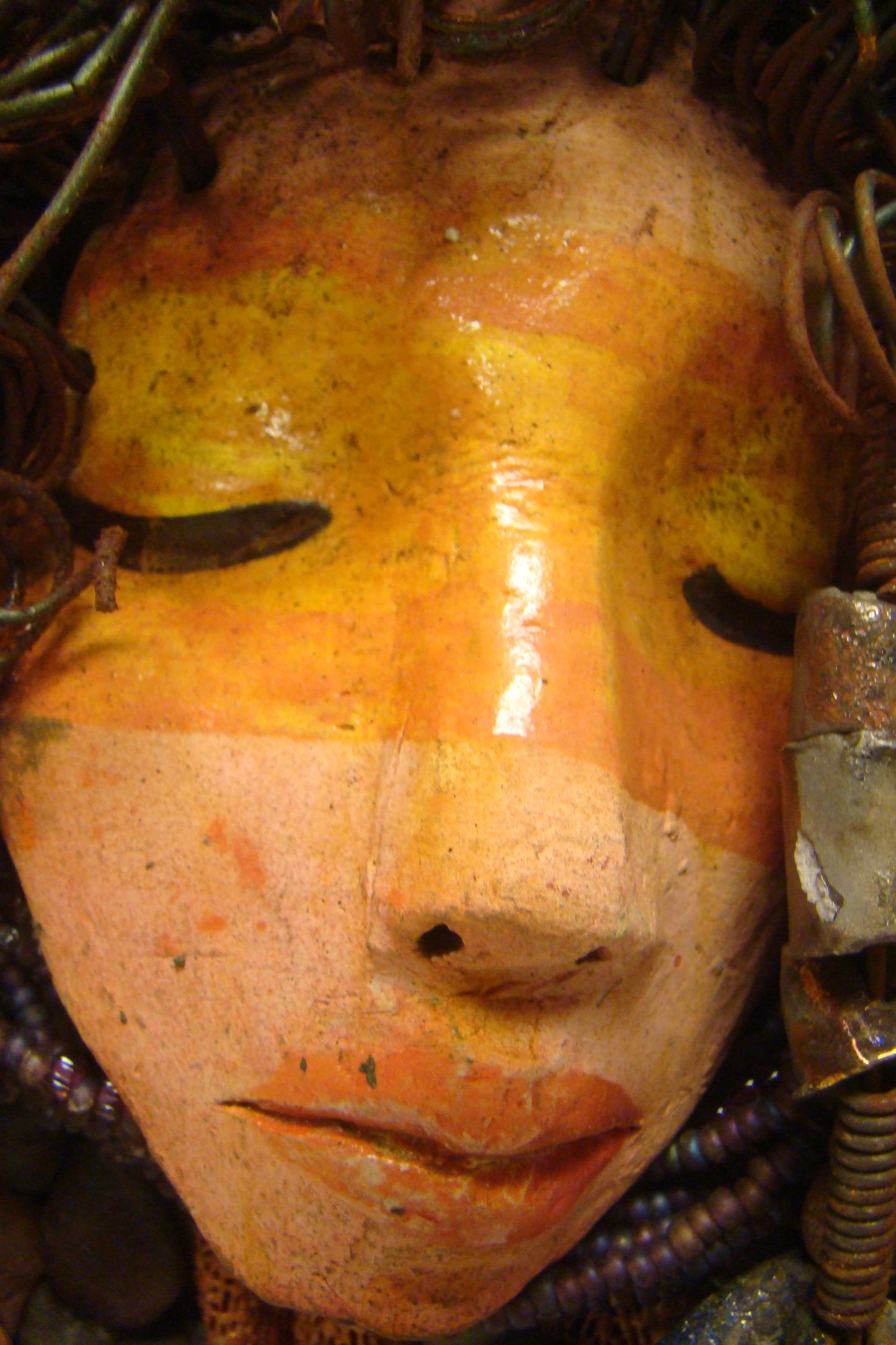 Petra is mounted on a 9"x 12" painted canvas. I spent about 4 hours or more just fixing Petra's hair and attaching beads! Petra has over 40 feet of 16 gauge wire for hair and over 50 raku beads. Petra has an amber and brown crackle face with rust brown lips. Petra is ready to be hung! Free Shipping!