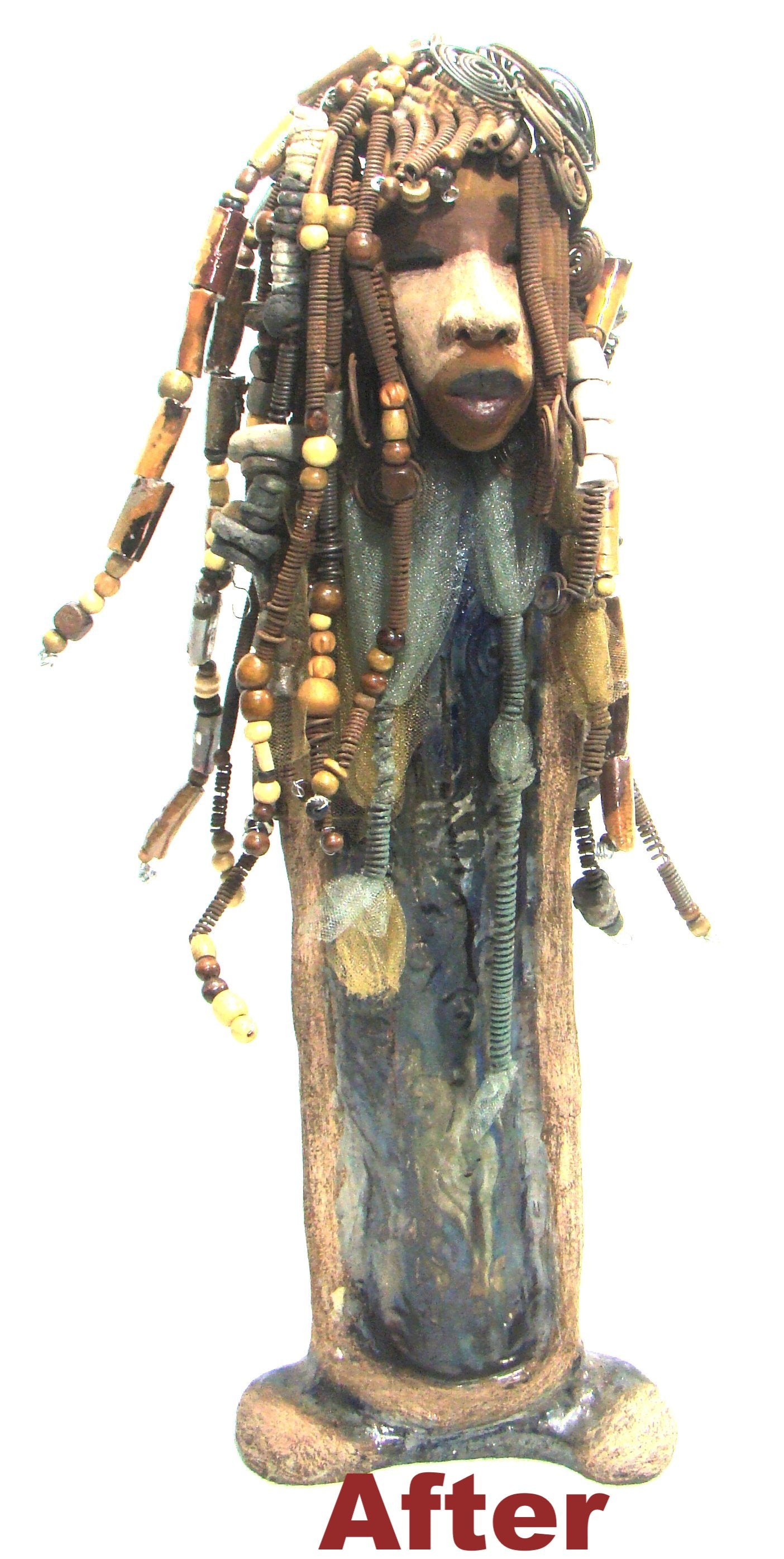 Sabrina stands 23" x 8" x 5" and weighs 9.2 lbs. She as an awesome two tone honey brown complexion. Sabrina's dress is a dark metallic blue with streaks of copper. A blue and gold tulle drapes around her neck Sabrina has long loving arms found typically on Herdew's sculptures. Sabrina sits with anticipation of being a show piece in your home especially now with her New Makeover!