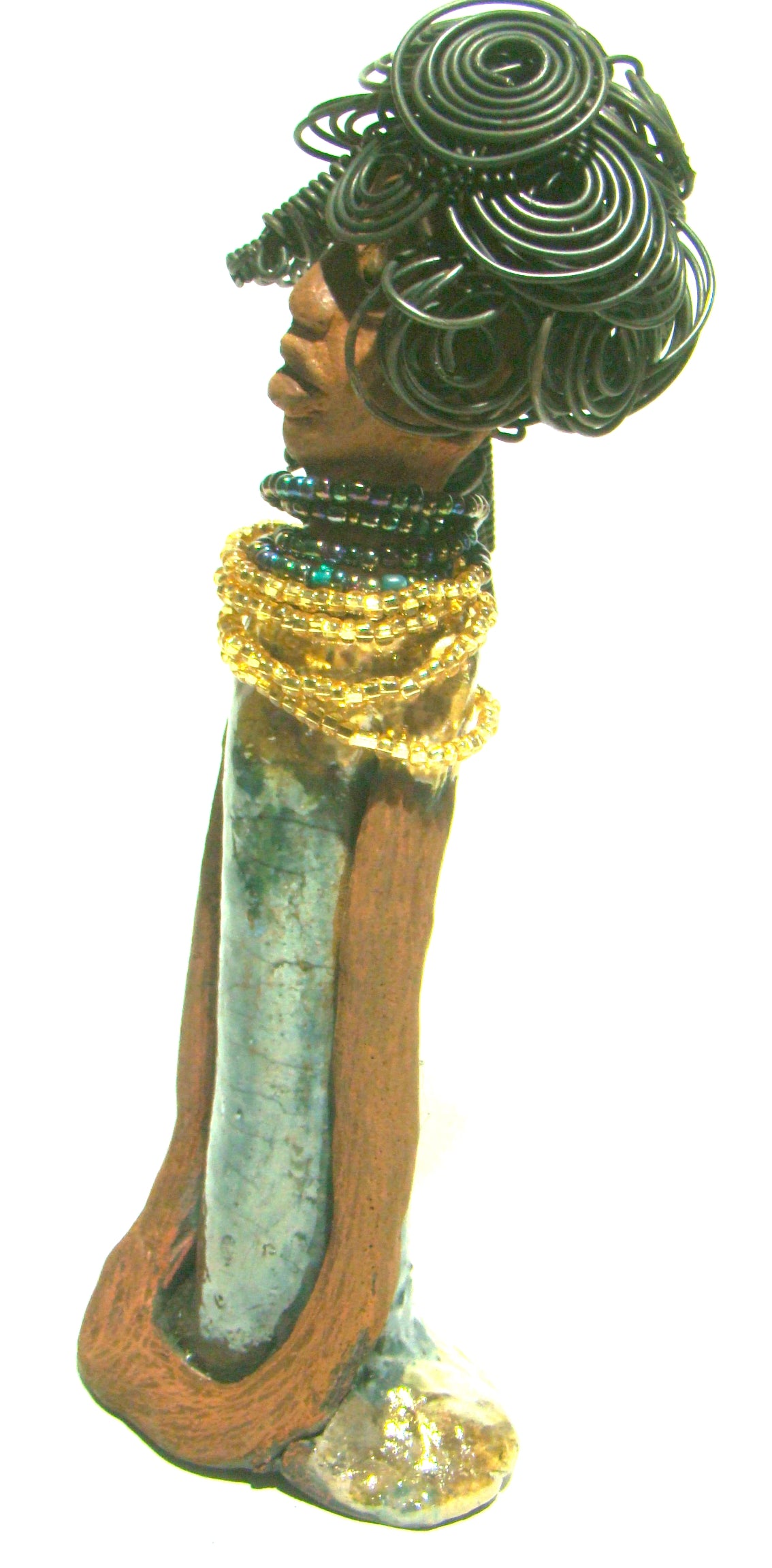Sophia stands 10.5" x 4" x 3" and weighs 1.10 lbs. She has a honey brown complexion with curls, coils and twisted, wire hair. Sophia wears a light blue crackle dress with a dazzling gold and multicolored beaded necklace.