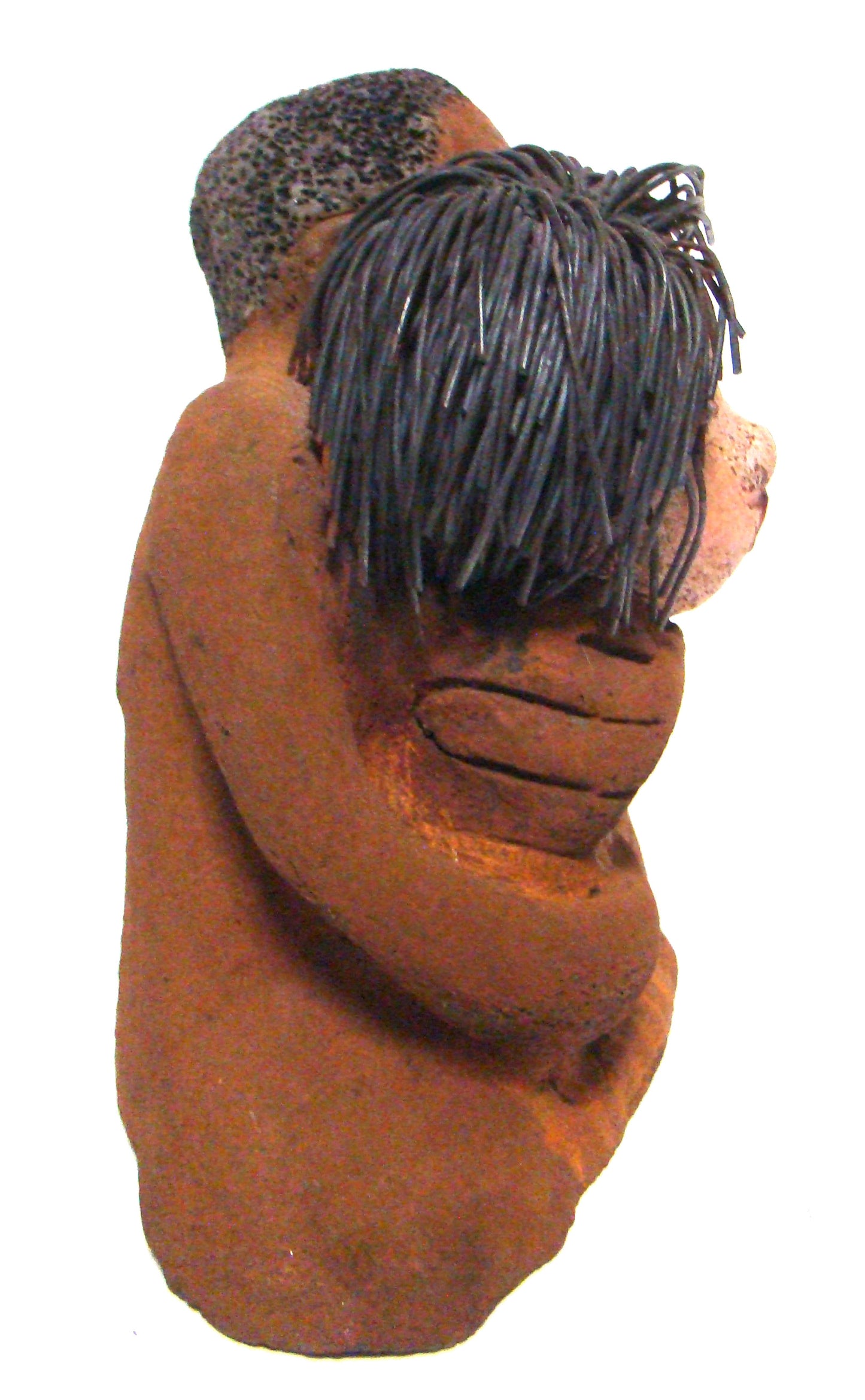 Loving You stands 9" x 9" x 5" and weighs 5.02 lbs. He has a honey brown complexion, she is high beige brown. She has vertical yellow brown on her dress. His arms are totally wrapped around her.