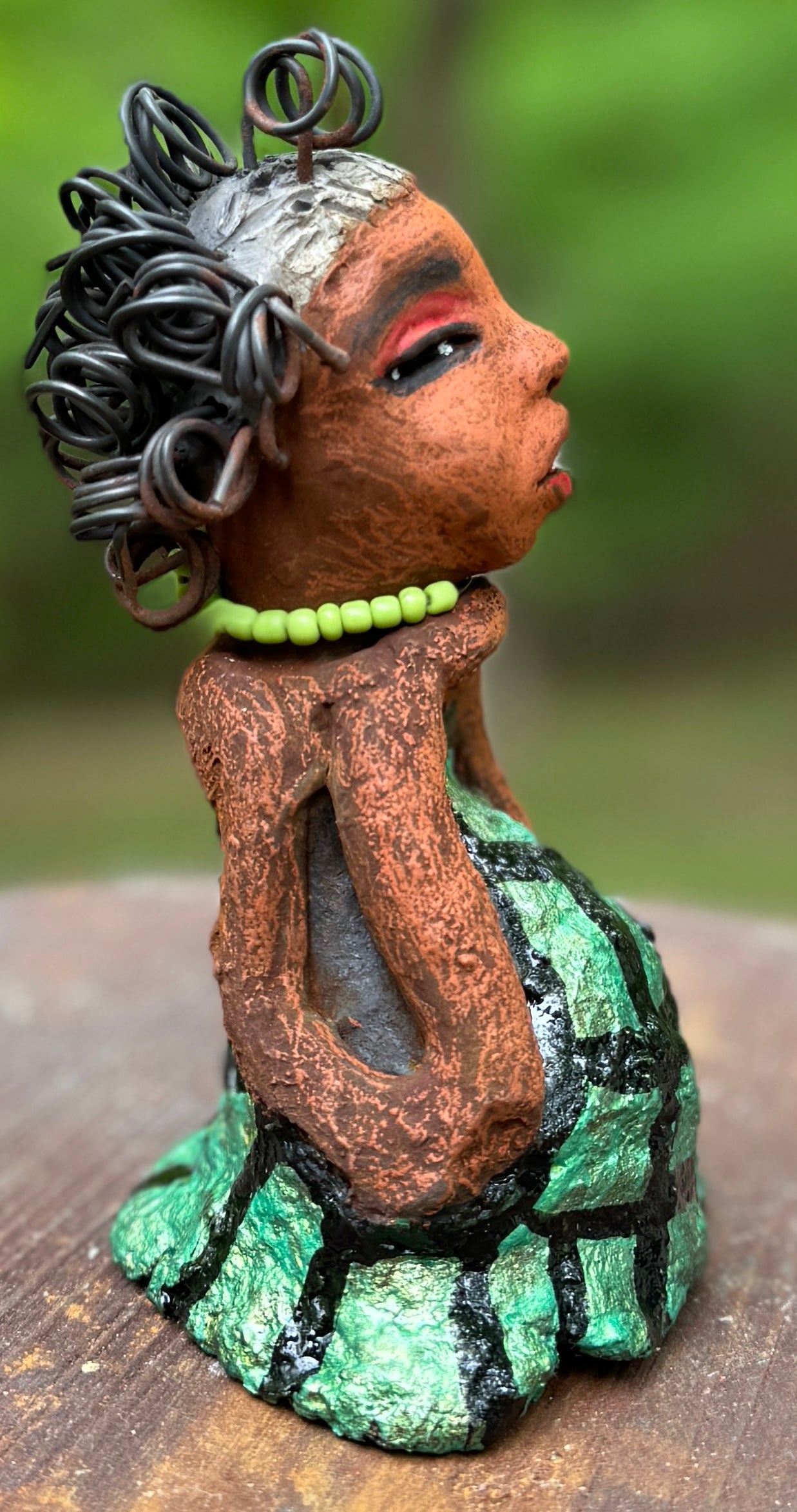 <p>Say hello to Salana, the daring figurine standing at 4.5" x 3.5" x 3" and weighing a mere 8.5 ozs. Adorned in a striking black and white African print dress and with her coiled hair as her crown, Salana exudes boldness with her head held back and bravery as she sits in a yoga pose, radiating confidence. Embark on an adventure with the Herdew Collection and feel the exhilaration of free shipping and our customer-friendly return policy. Don't let this unique piece slip away!</p> <p>&nbsp;</p>