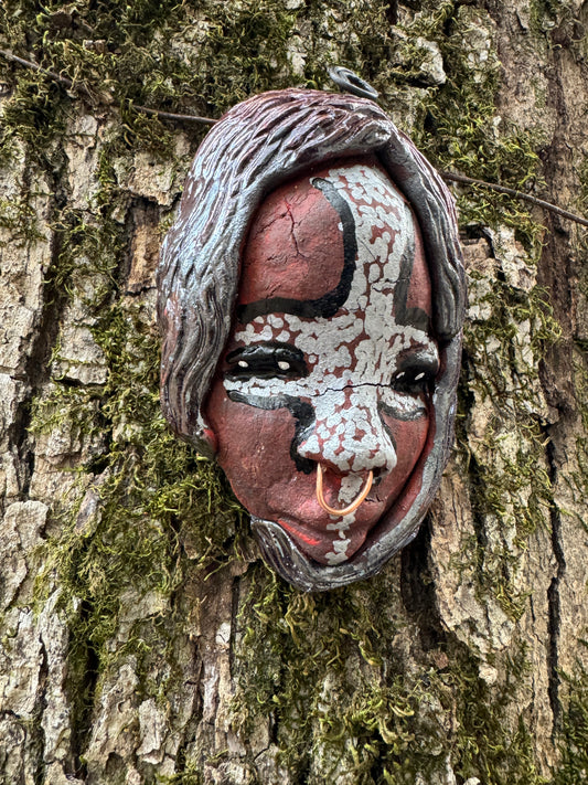 Bringing charm and vivacity, this mask will surely be a cherished adornment. Its tribal designs add pizzazz and make any room sparkle! It measures 4" x 3" x 2" and weighs approx. 6 ozs.