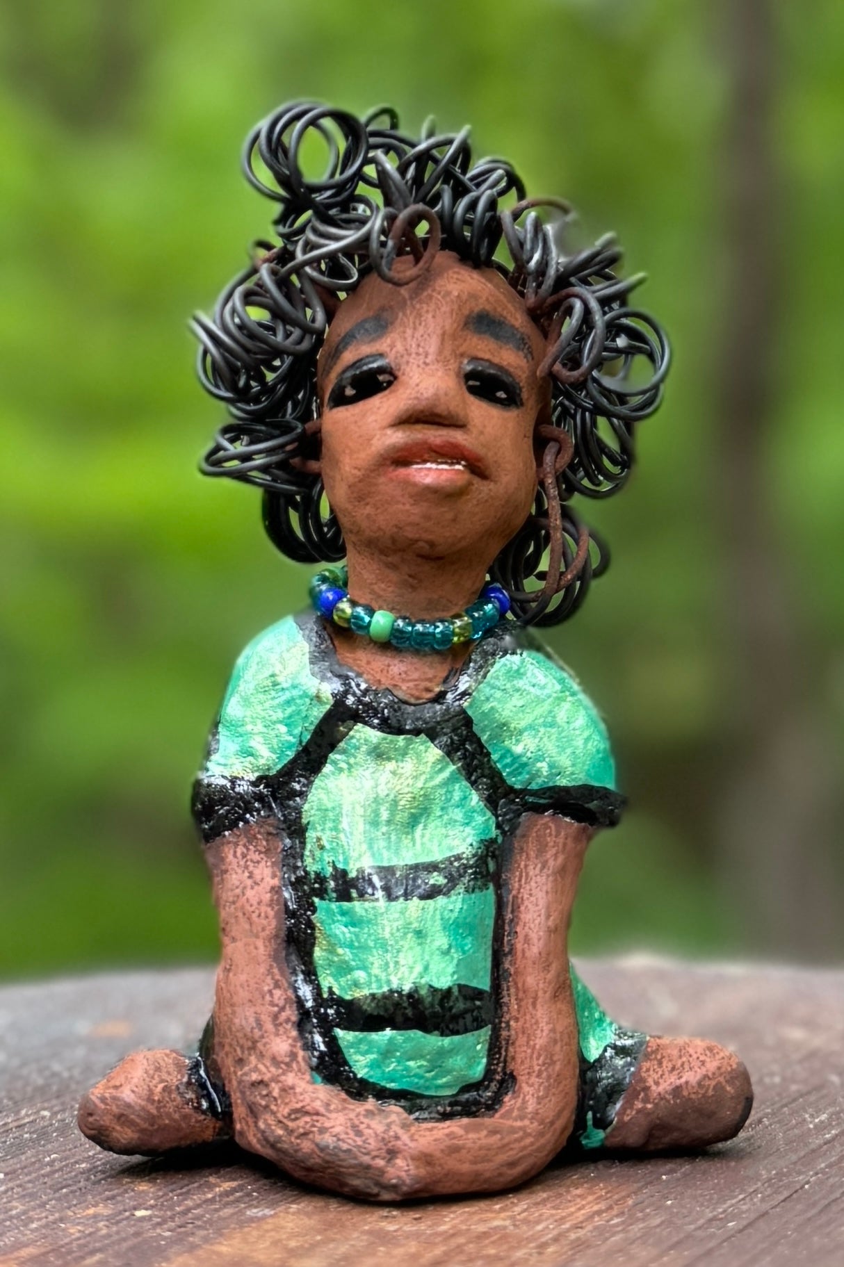 <span>Meet Anza, the brave figurine standing at 6" x 4" x 3" and weighing only 10 ozs. Adorned in a striking striped dress and with her hair styled in a regal coil, Anza represents adventure and determination as she relaxes in a yoga pose, exuding curiosity. Join the Herdew Collection today for the rush of free shipping and our easy return policy. Don't let this unique piece slip away! <br></span> <p>&nbsp;</p>