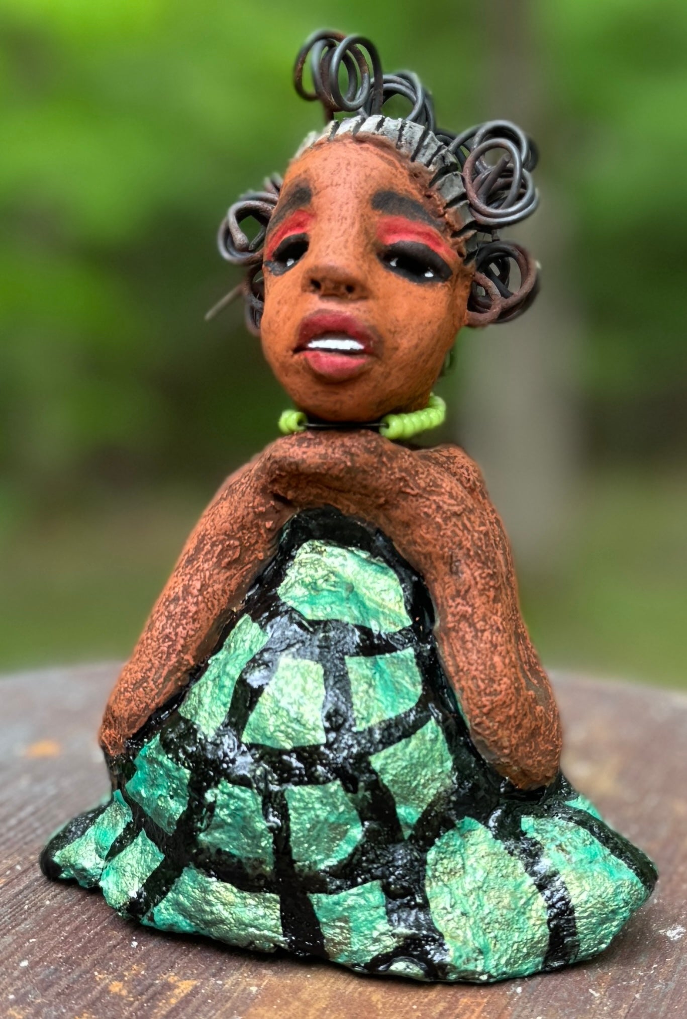 <p>Say hello to Salana, the daring figurine standing at 4.5" x 3.5" x 3" and weighing a mere 8.5 ozs. Adorned in a striking black and white African print dress and with her coiled hair as her crown, Salana exudes boldness with her head held back and bravery as she sits in a yoga pose, radiating confidence. Embark on an adventure with the Herdew Collection and feel the exhilaration of free shipping and our customer-friendly return policy. Don't let this unique piece slip away!</p> <p>&nbsp;</p>