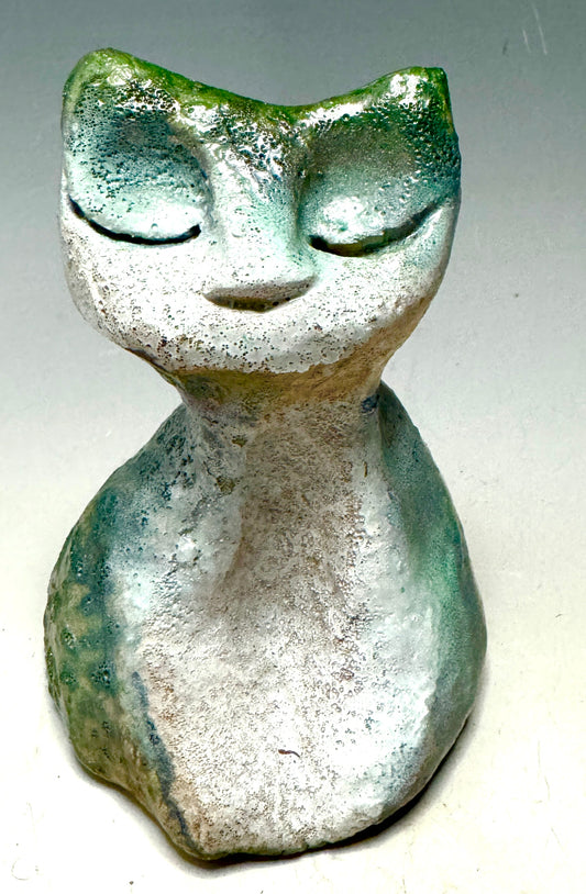 Welcome HK-9, the purr-fectly marvelous mouser mate! She's 4.5' x 3" x 4" of lightweight love, adding that spark to any room. Her dazzling emerald green and 5oz fluff brings a grin to your face. Get a mood boost with this pawsome pussycat pal!