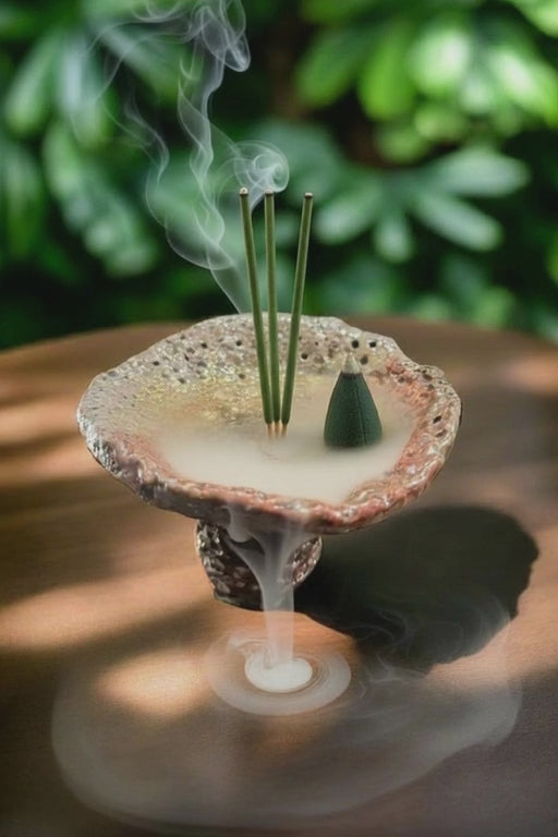 raku incense holder with black flow cone incense burning