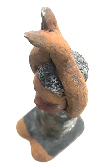 I Adore Thee!      I Adore Thee stands 8" x 3" x 4" and weighs 1 lb.     Young man make of clay on his knees.     This work of art speaks for itself.     Great as a gift  Awesome starter from the Herdew Collection.