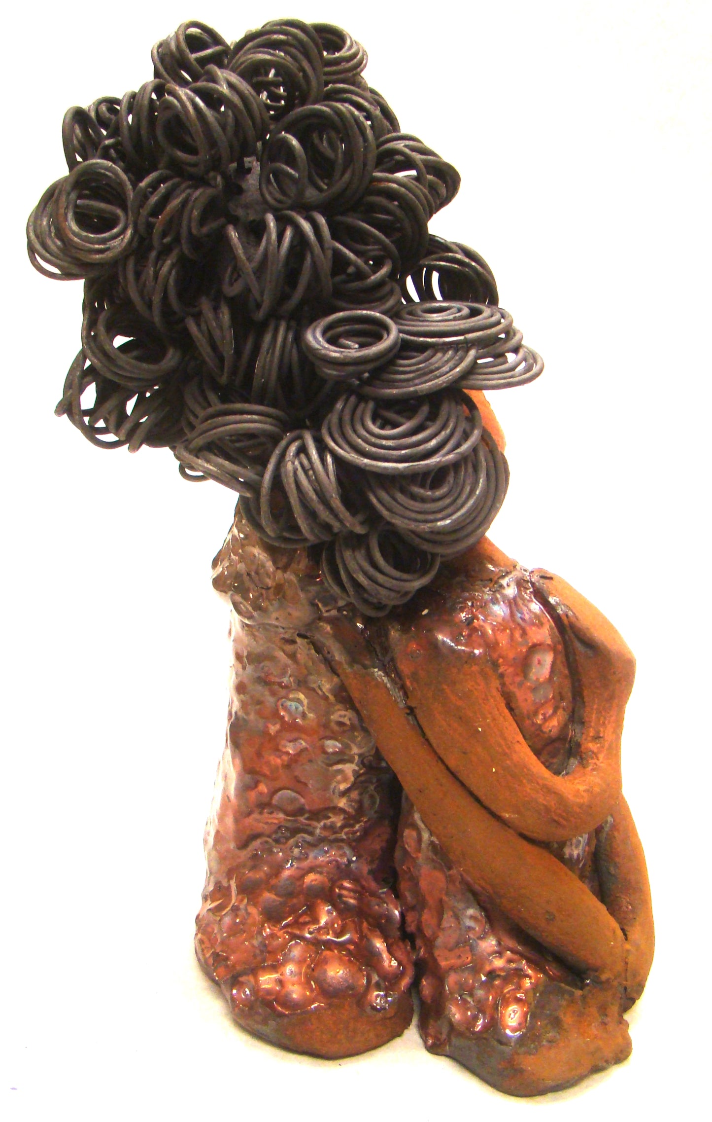 I Love You More stands 8.5 " x 4.5" x 4".5" and weighs 2.10 lbs. They have lovely honey brown complexions. Combined, I Love You More has over 25 feet of curly wire hair. They have glossy metallic copper dresses. They have long loving arms. One  is embracing the other. I Love You More! will  help illustrate the love that is in your home! Free Shipping!