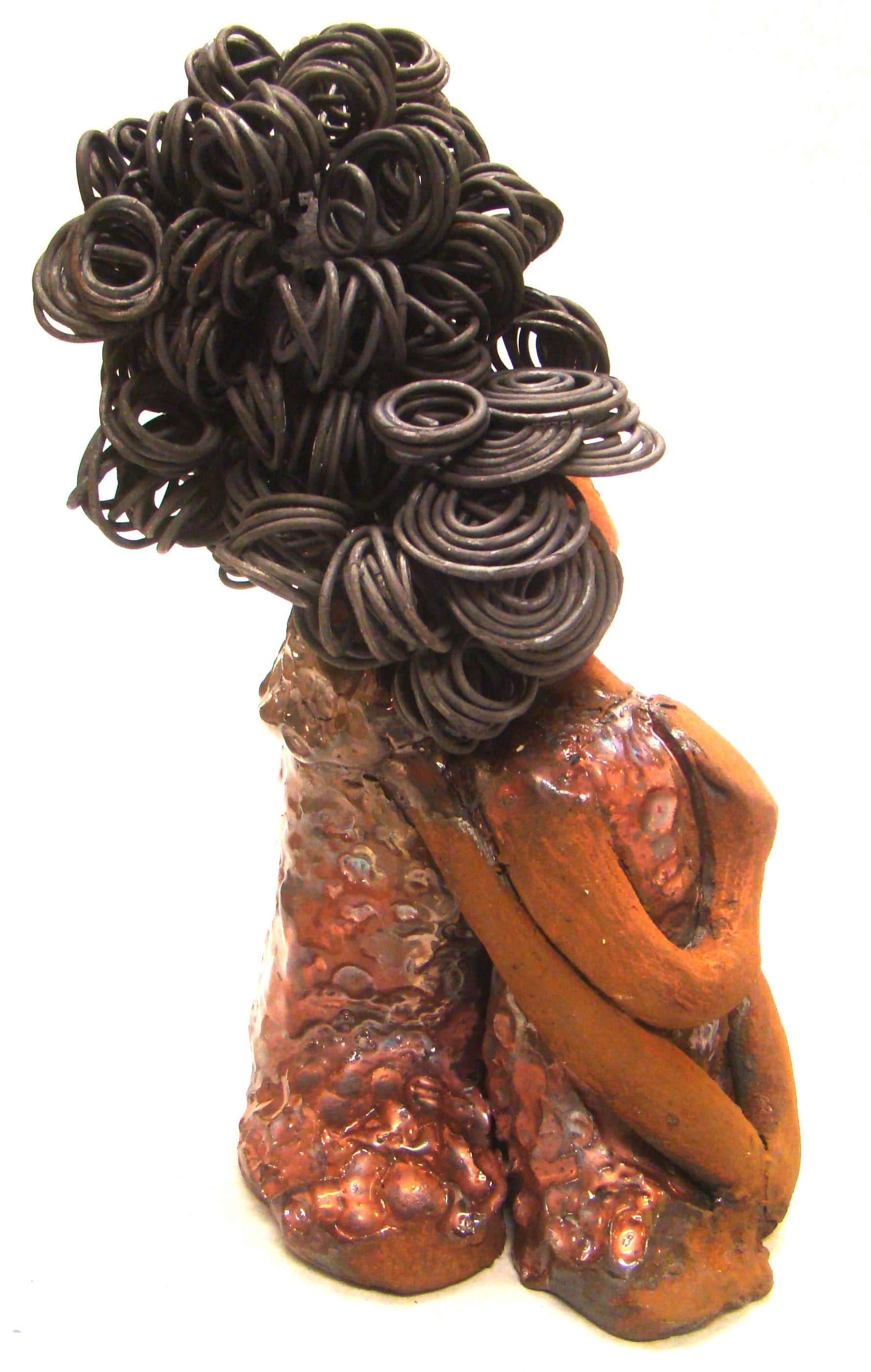 I Love You More stands 8.5 " x 4.5" x 4".5" and weighs 2.10 lbs. They have lovely honey brown complexions. Combined, I Love You More has over 25 feet of curly wire hair. They have glossy metallic copper dresses. They have long loving arms. One  is embracing the other. I Love You More! will  help illustrate the love that is in your home! Free Shipping!
