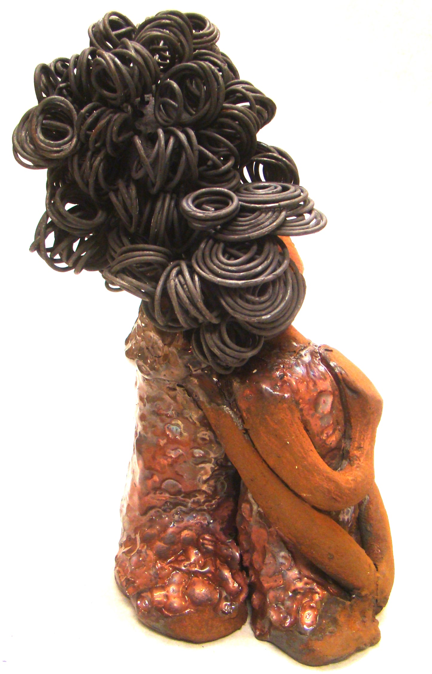 I Love You More stands 8.5 " x 4.5" x 4".5" and weighs 2.10 lbs. They have lovely honey brown complexions. Combined, I Love You More has over 25 feet of curly wire hair. They have glossy metallic copper dresses. They have long loving arms. One  is embracing the other. I Love You More! will  help illustrate the love that is in your home! Free Shipping!