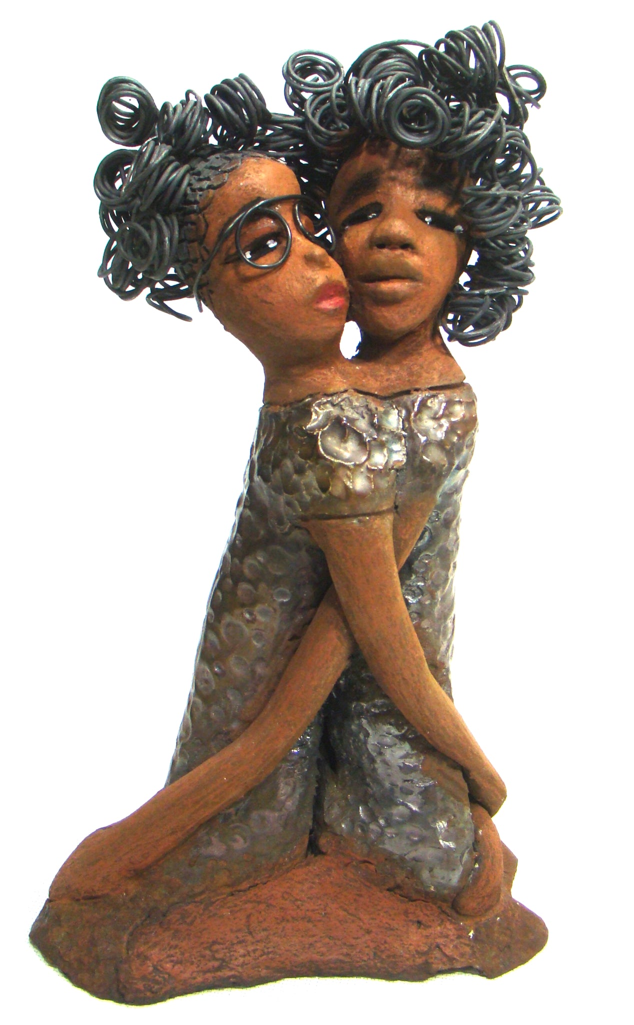      My BFF stands 13" x 8" x 4" and weighs 4.13 lbs.     Both girls have lovely honey brown complexions.     Their dresses are textured and have copper metallic glazes.     The long loving arms of My BFF embrace one another with love.     My BFF has over 25 feet of curly 16 gauge wire hair.     My BFF represents the close bond and friendship that has developed between all women of every race, ethnicity, and color.     My BFF will make an excellent gift to your BFF!     Free Shipping!
