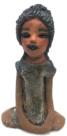 Meet Brenda!      Brenda stands &' x 4" x 2.5" and weighs 11 ozs.     She has a lovely honey brown complexion.     Brenda wears a metallic green dress.     Her hair is smokey black.and made of clay.     Brends's long loving arms rest at her side.  Brenda will make a great gift or a starter piece from the Herdew Collection!
