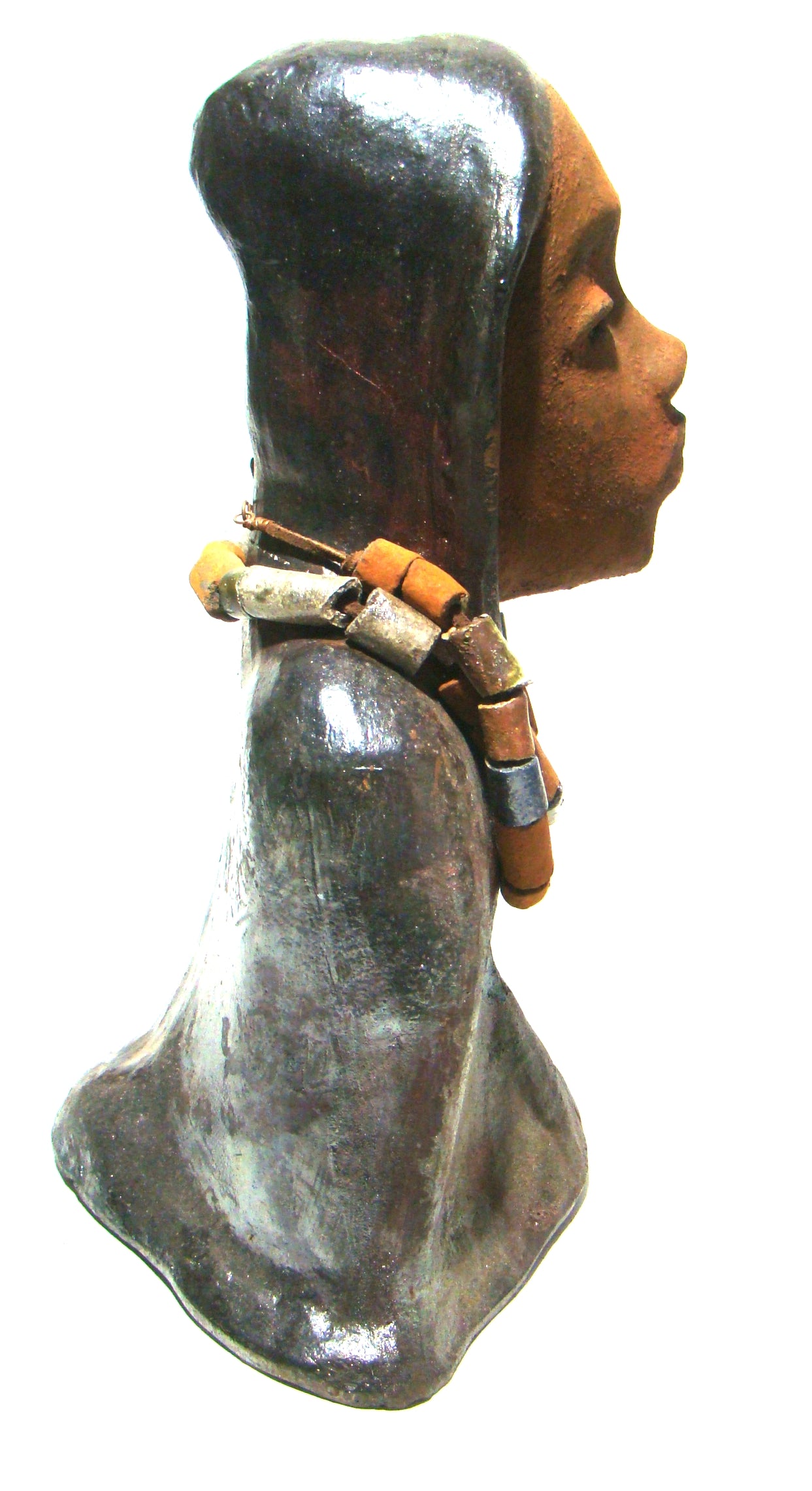 Carlos stands 15" 10" x 7" and weighs 6.13 lbs. He wears a metallic multi colored hoodie with earthy raku beads. Carlos has a honey brown complexion. He seems to be in deep thought. Carlos would add gentleness to that special place in your home.