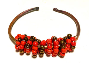 Multi colored red orange and tan beads soft copper band for easy opening  adjustments ball ends