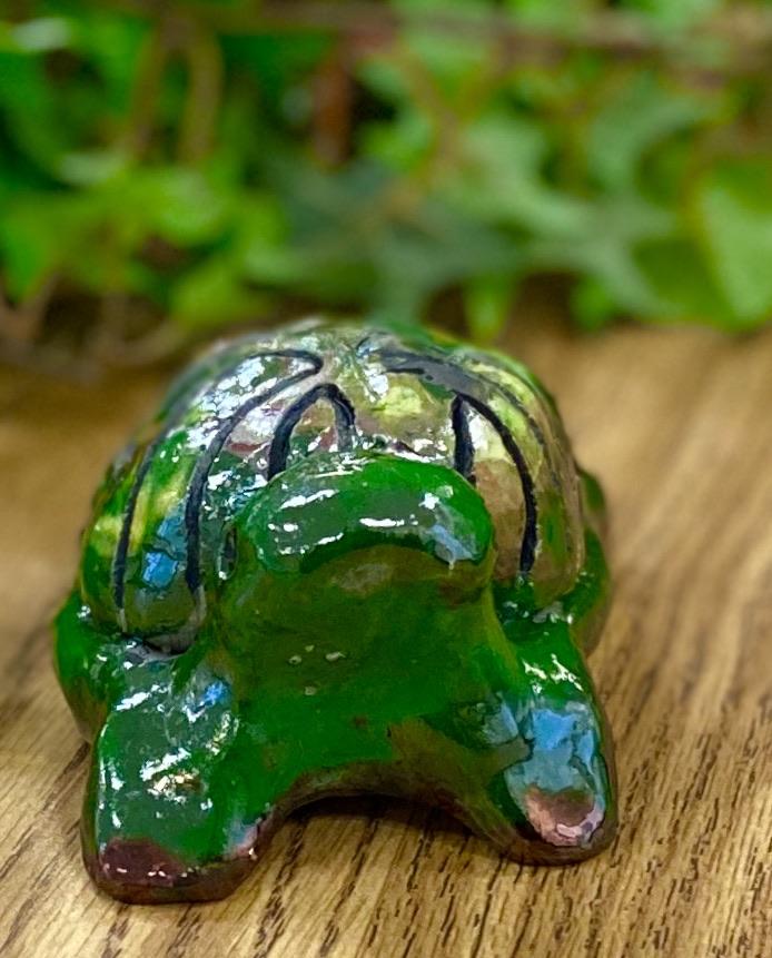 Boys, girls, men, and women of all ages talked about how cute they are. They got a kick out of and adored the turtles that were named after someone they knew". Tommie is 2" x 2" x 4" and weighs 5.8 ozs. Tommie has a glossy green and copper complexion. Tommie is ready to Go!!