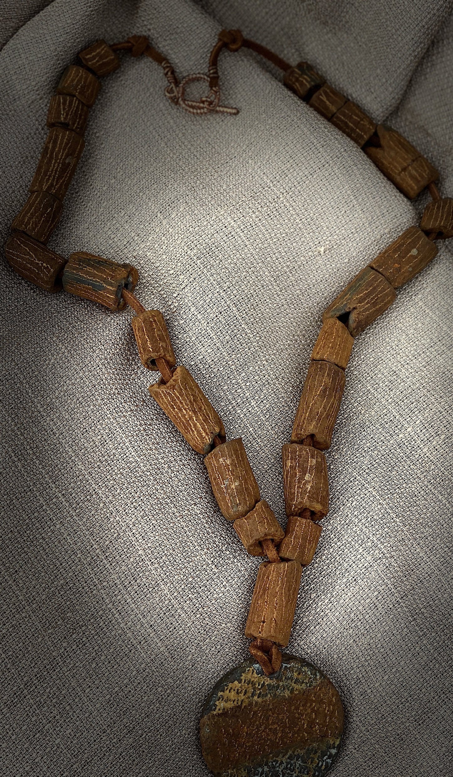 Nice, Light, and Earthy!  Large centerpiece Raku bead (23 )  earthy Raku beads 11” hang- brown suede cord 