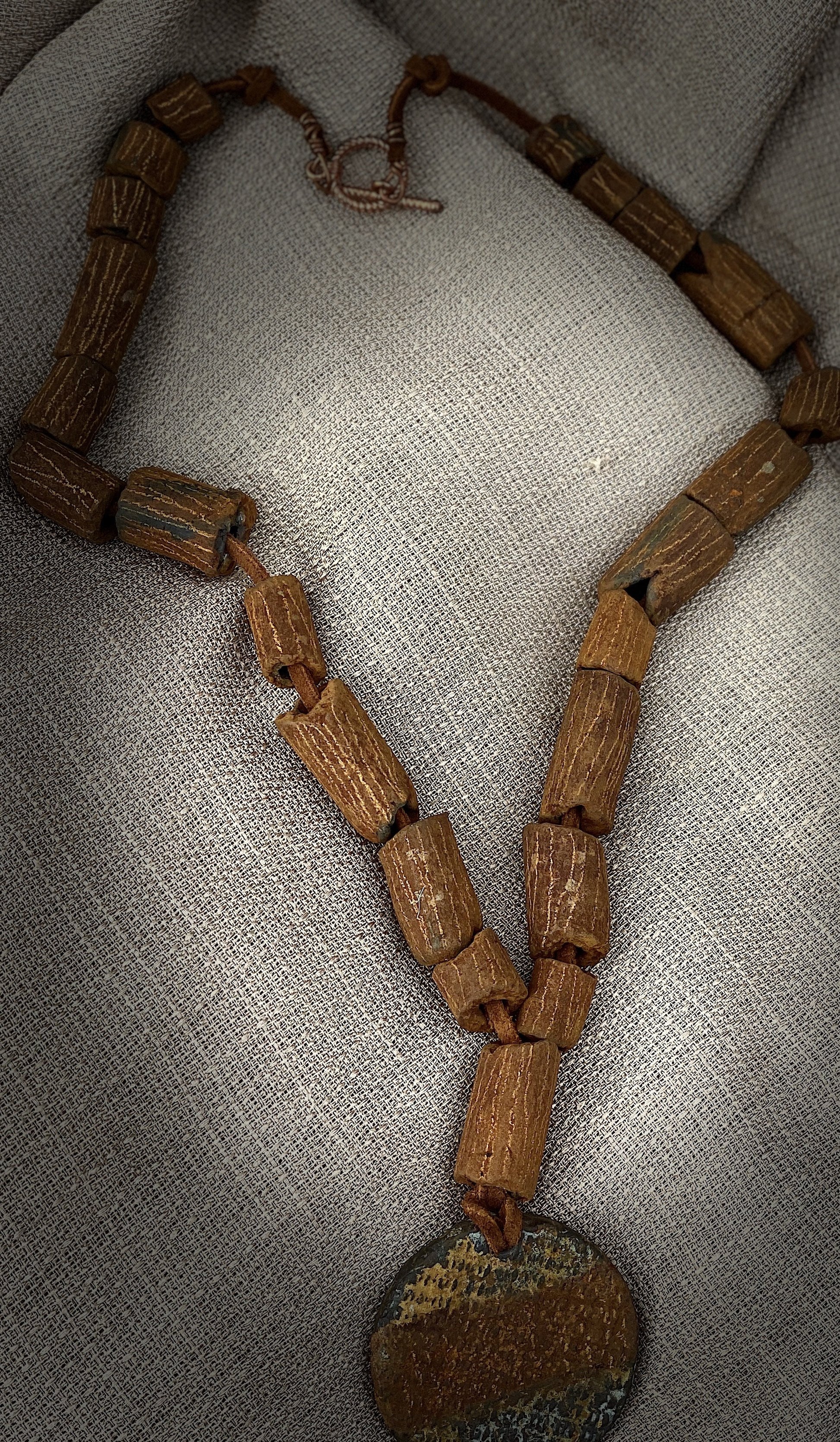 Nice, Light, and Earthy!  Large centerpiece Raku bead (23 )  earthy Raku beads 11” hang- brown suede cord 