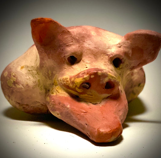 This Little Piggy named Mike is 4" x 5' x 6" and weighs 1.8 lbs. Mike has a matte and satin pinkish complexion. Mike little curly tail is made of wire.