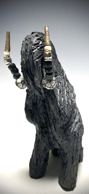 "Elephants are one of my favorite animals to create. They are so majestic" This raku fired elephant stands 7" x 2" x 2.5" and weighs 10 ounces. She has beaded tusks and a textured smokey black body. Nice! Great for a gift!