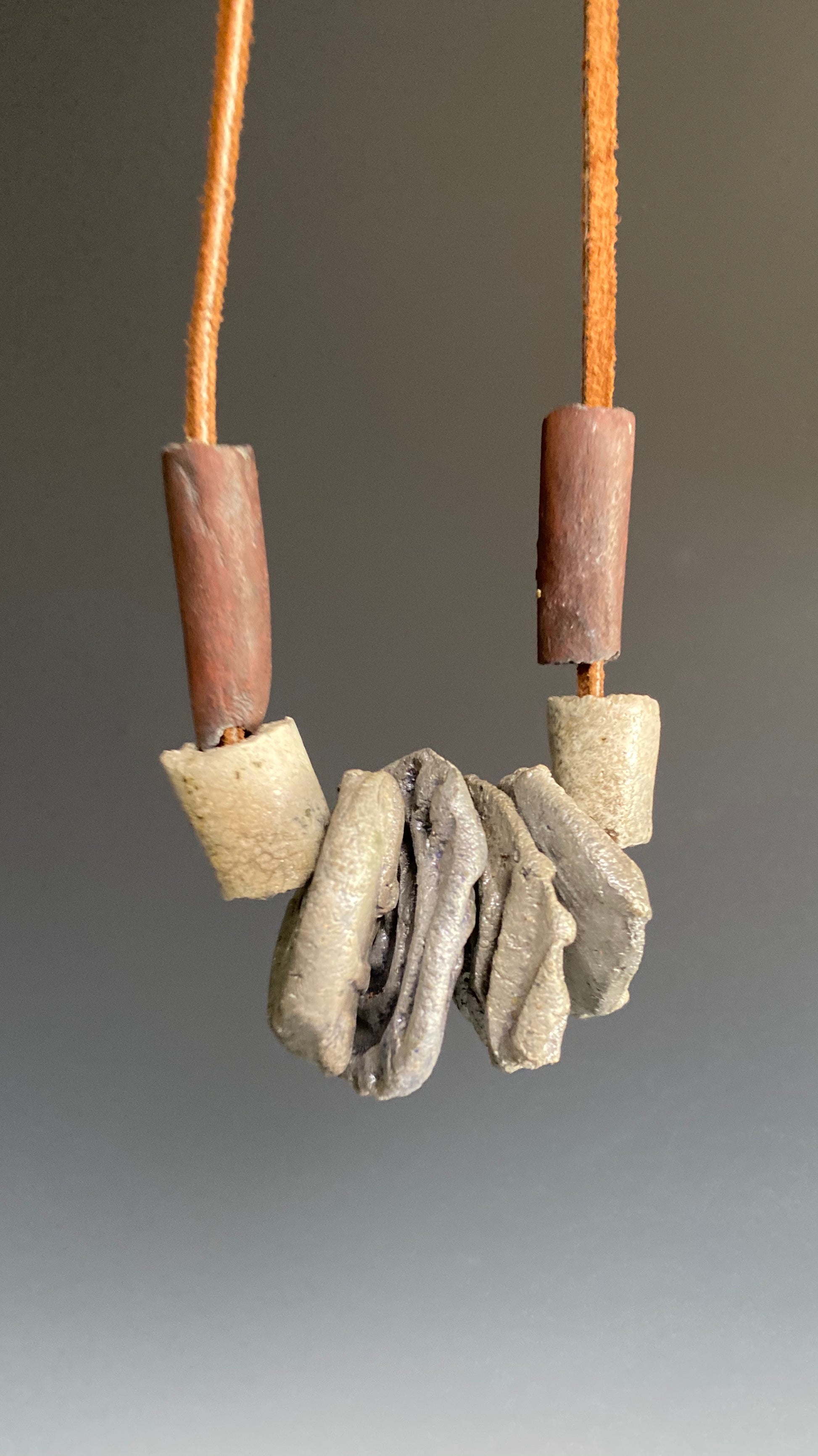Simple and Beautiful! 8 multi size / color raku beads 8" hang  brown suede cord Amazingly Lightweight! 2.3 ozs!!