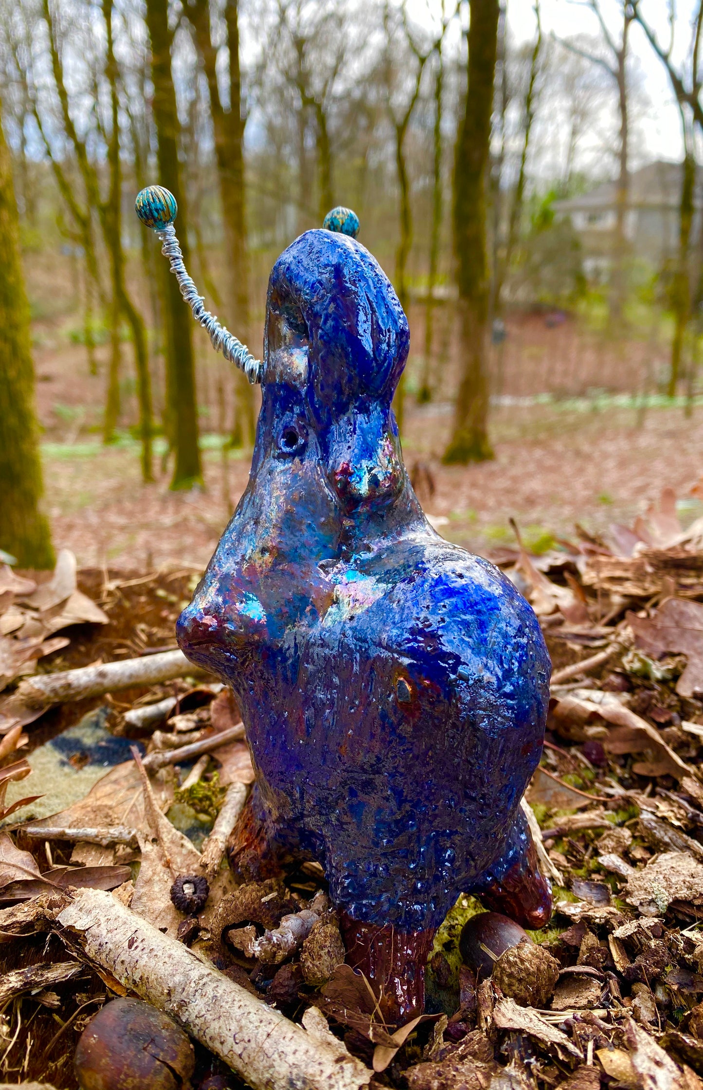 Have you HERD!!!!!!  Just one of these lovely Raku Fired Elephant will make an excellent gift for your  friend, sorority or for your home’ special place centerpiece.  7" x 4" x 4" 15 ozs. Silver wire beaded blue tusk Beautiful metallic blue raku colors For decorative purposely only.