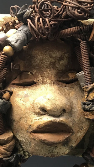 Norway  has over 30 feet of 16 gauge wire for hair and over 35 raku and wooden beads. Norway has an awesome honey brown copper crackle face and lips. Norway   is ready to be hung! Shipping and Returns 