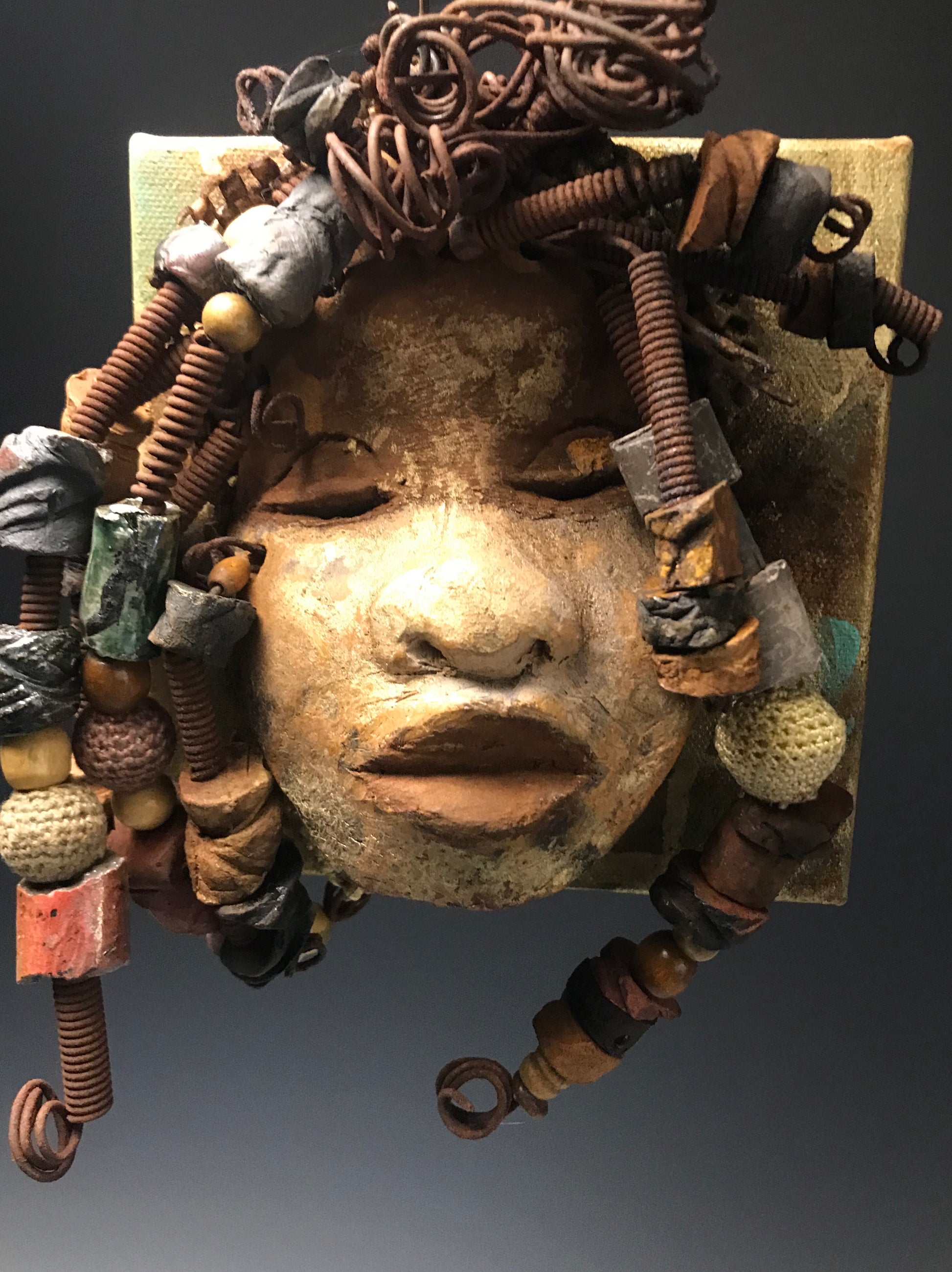 Norway  has over 30 feet of 16 gauge wire for hair and over 35 raku and wooden beads. Norway has an awesome honey brown copper crackle face and lips. Norway   is ready to be hung! Shipping and Returns 