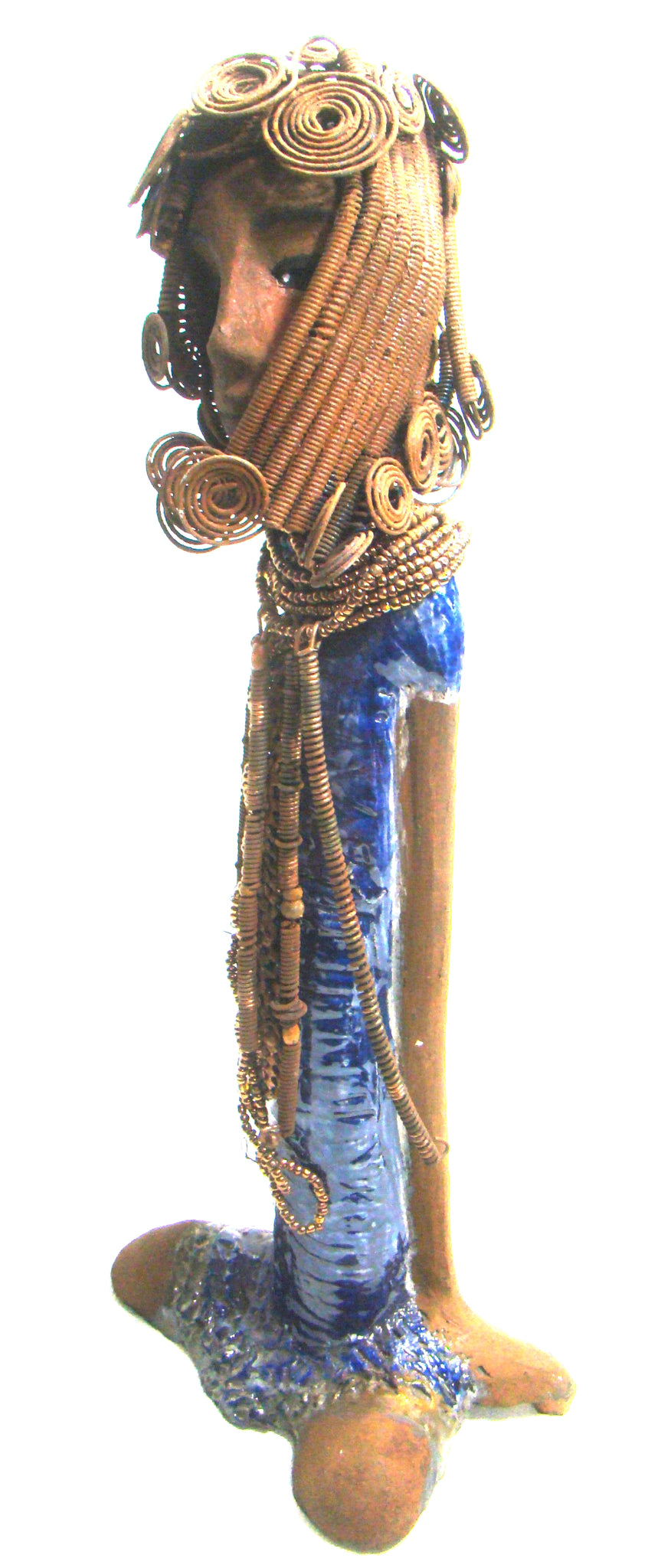      Kya stands 20" x 8" x 5" and weighs 6.04 lbs.     She has a lovely honey brown complexion.     Kya has over 40 feet of rust wire coils and spiral hair.     Her dress is a metallic blue with streaks of copper.     Her necklace is made from rust wire coils and amber beads.     Kya has long loving arms that are placed behind her.     Kya radiates like a blue diamond in the sky.     Give Kya a special place in your home!     Free Shipping!