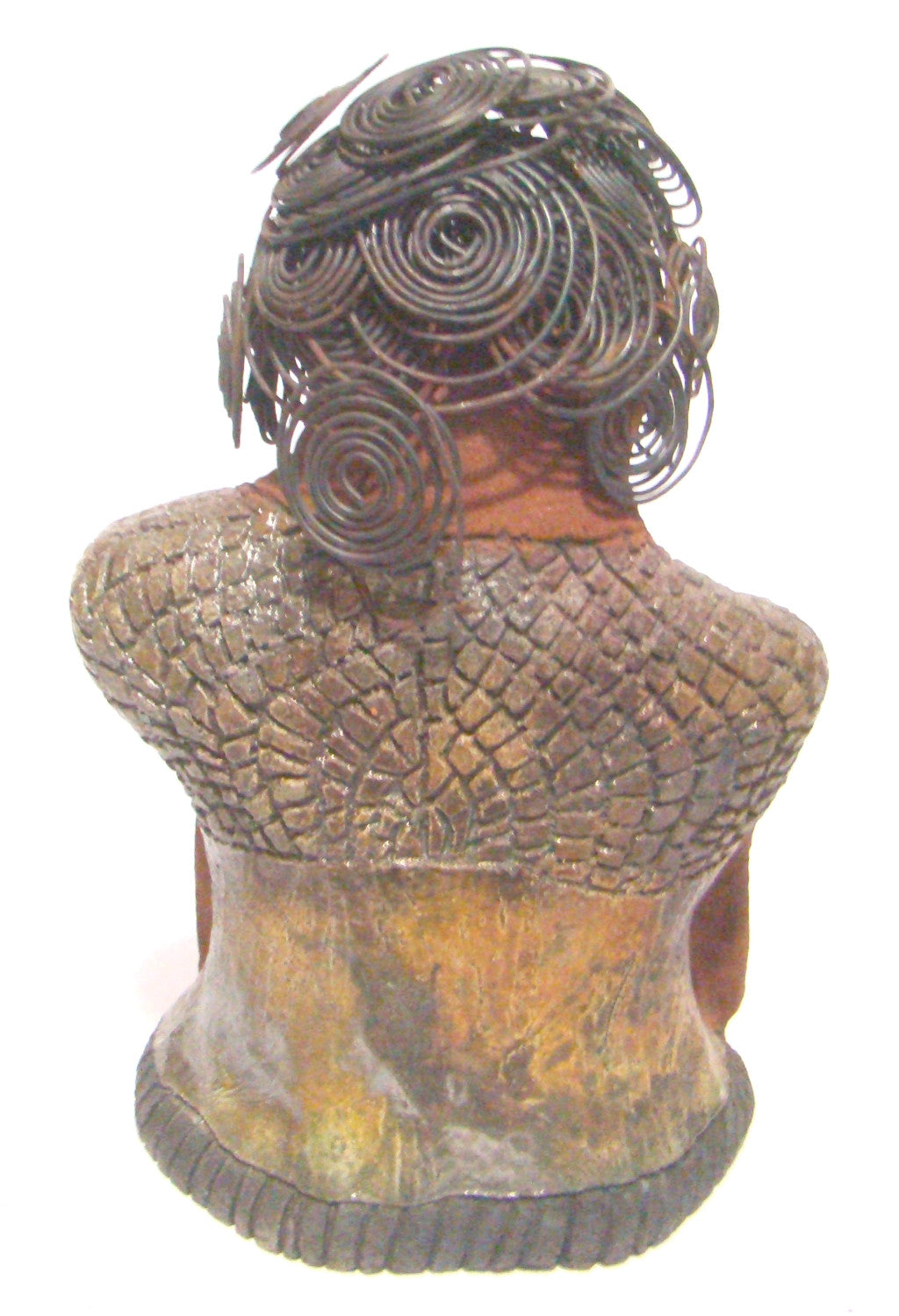 Her black curled wire hair measures over 15 feet.