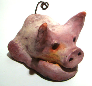 This Little Piggy is 4" x 5' x 6" and weighs 1.8 lbs